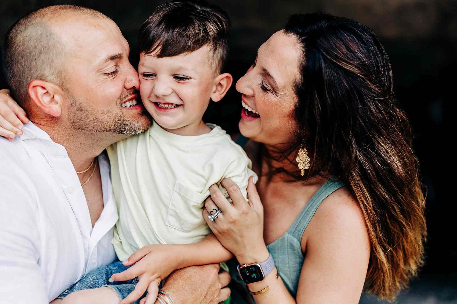 Natural family interaction captured during a Riviera Maya beach photoshoot