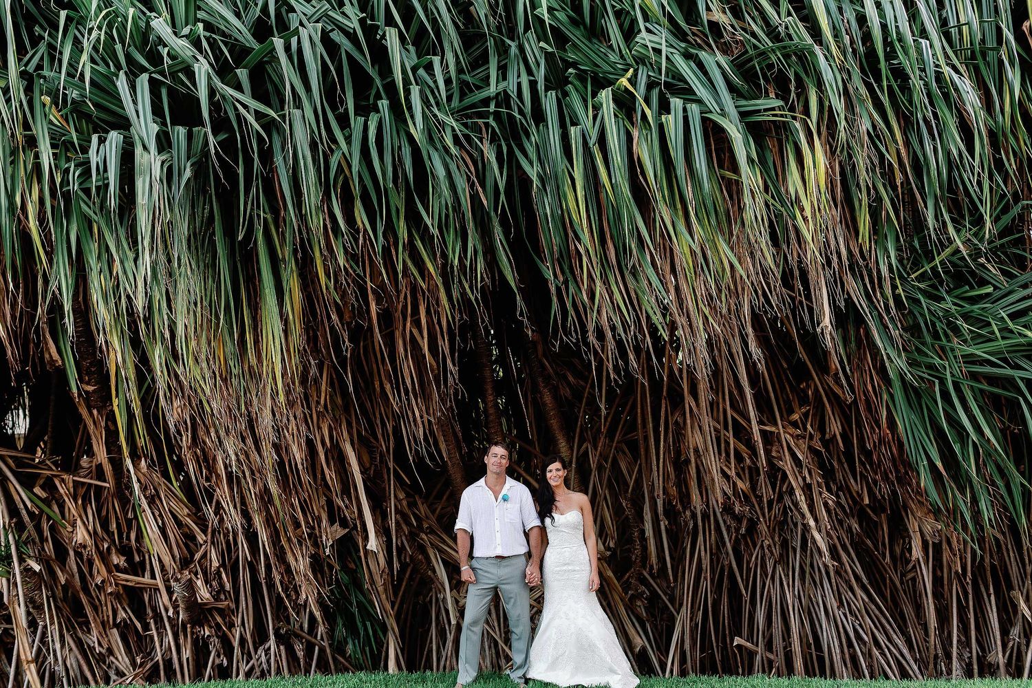 Jessica and Derek during their wedding at Moon Palace Cancun photographed by Luckie Photography