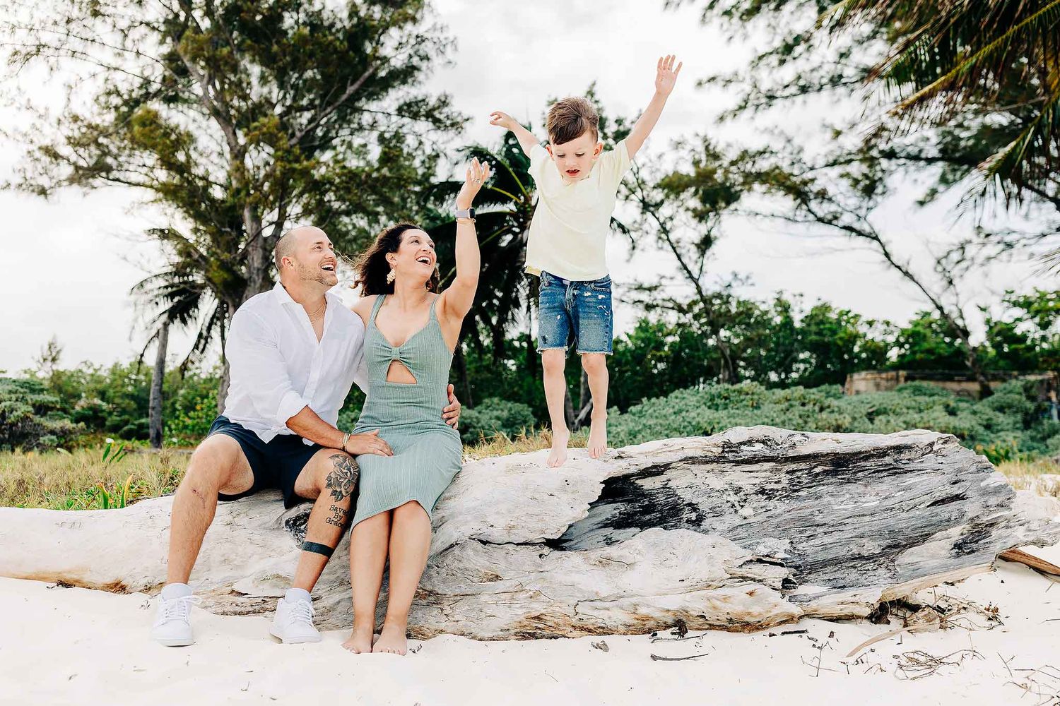Playful family photography session at Punta Esmeralda beach in Playa del Carmen Riviera M