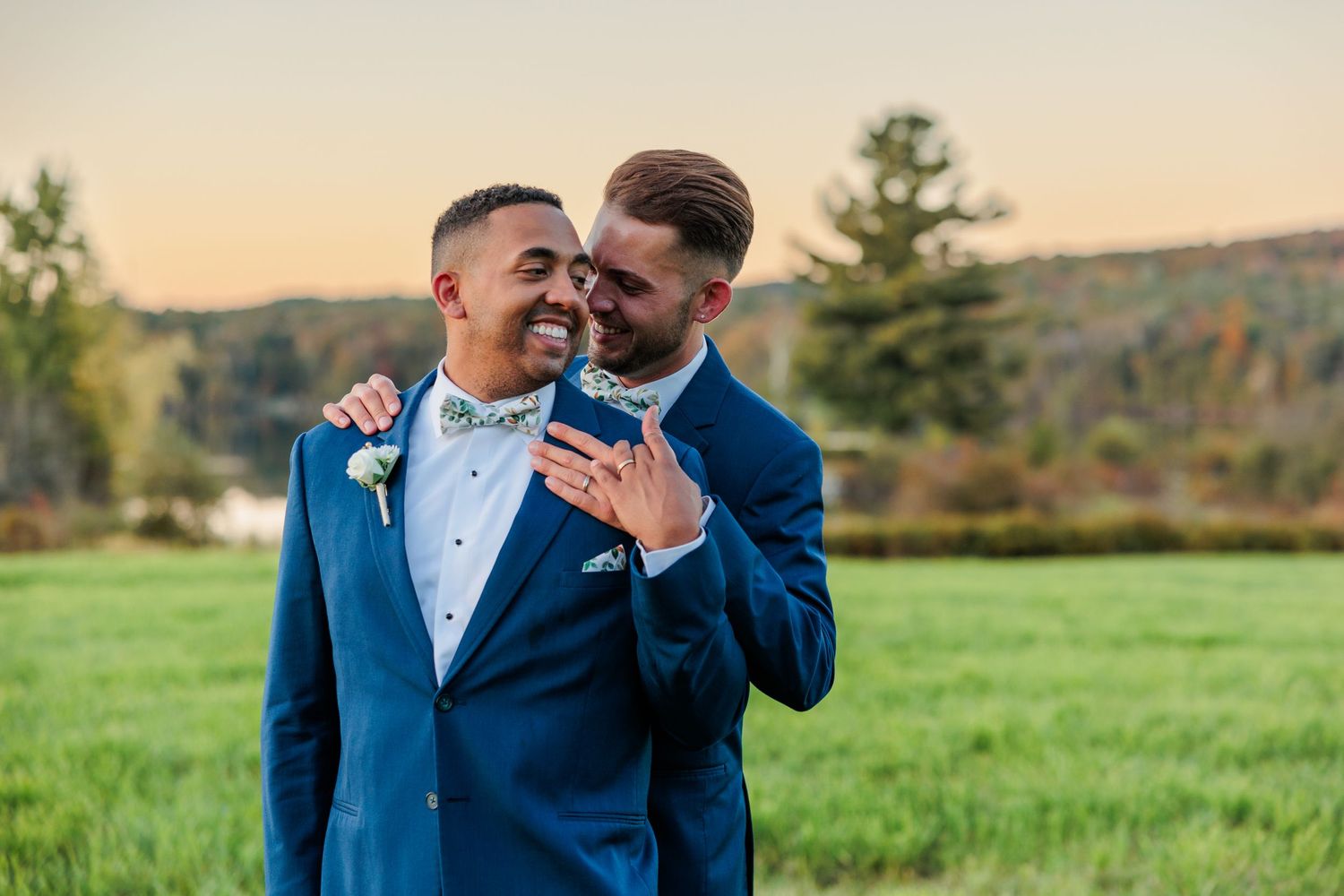 Emotional wedding ceremony moments captured at sunset with rolling hills in background.