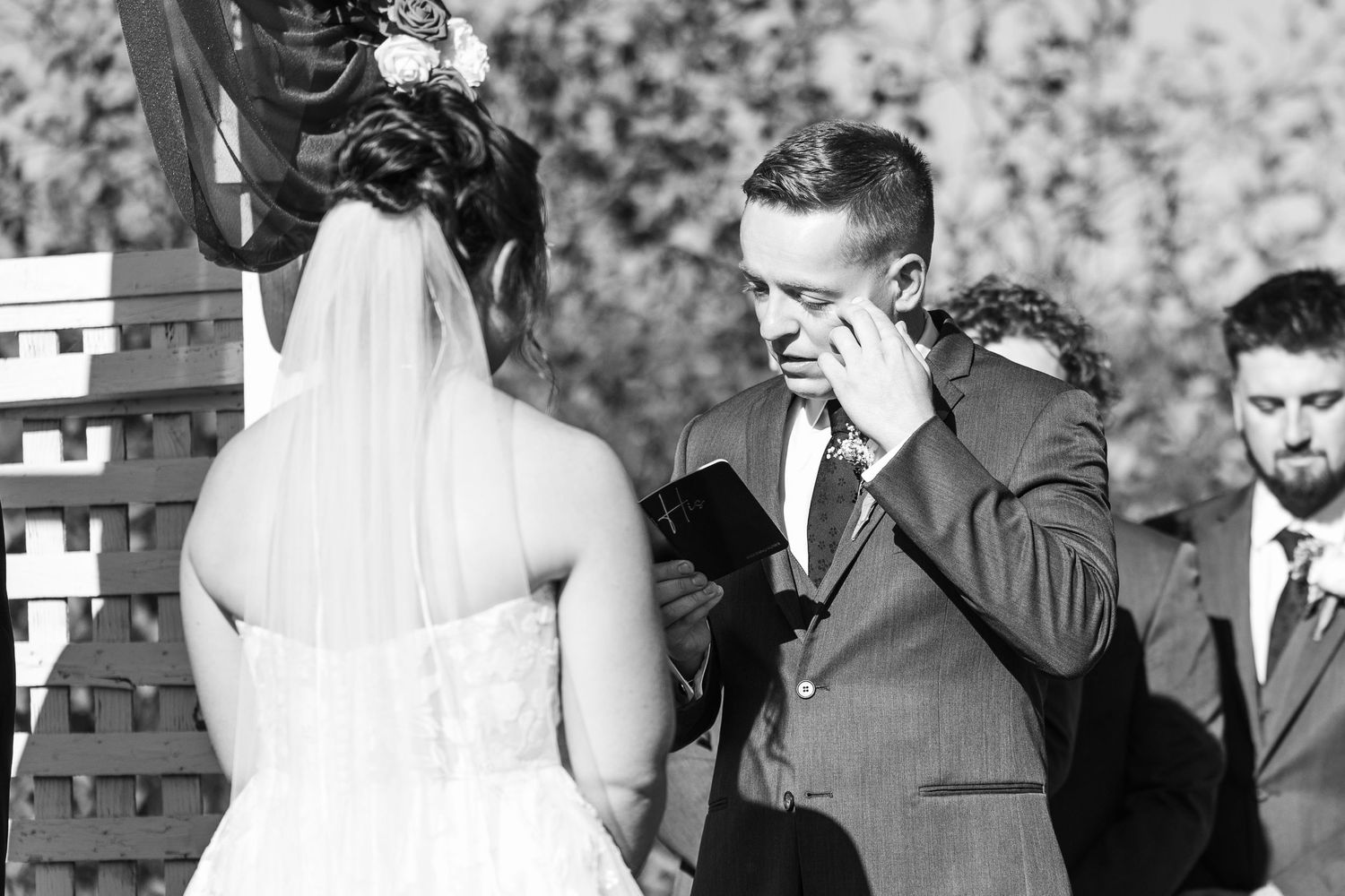 A black and white photo montage showing multiple wedding moments with couples, guests and celebrations.