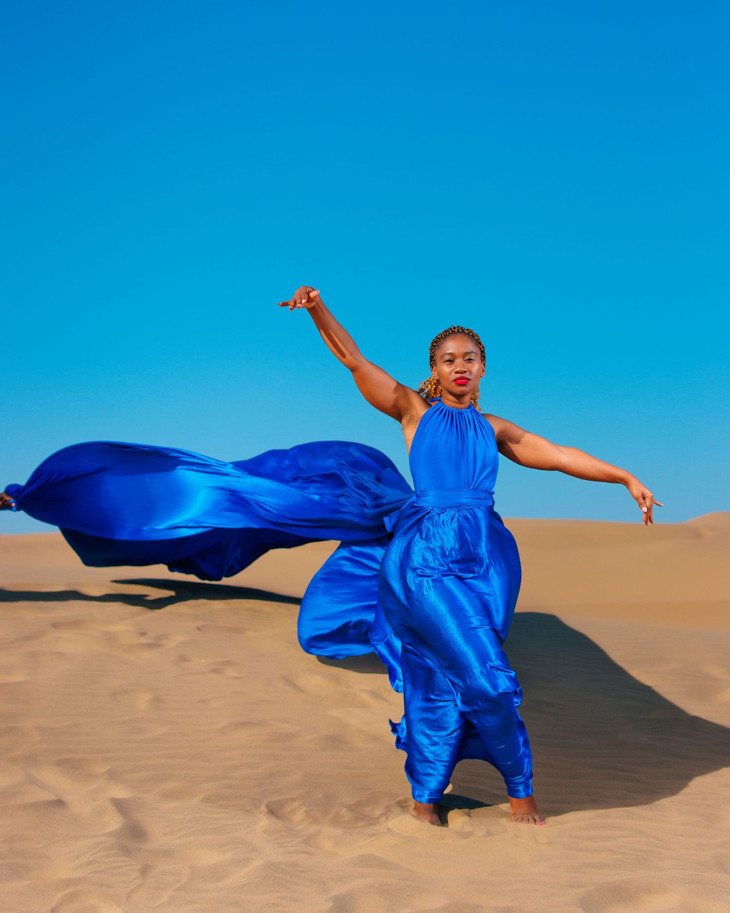 Namibia flying dress photoshoot in the Namib desert dunes close to Langstand. photographed by Walvis Bay and swakopmund flying dress