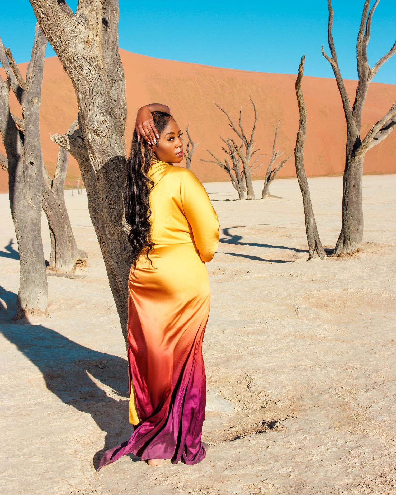 Sossusvlei and deadvlei photographer , professional photoshoot of American tourist at deadvlei