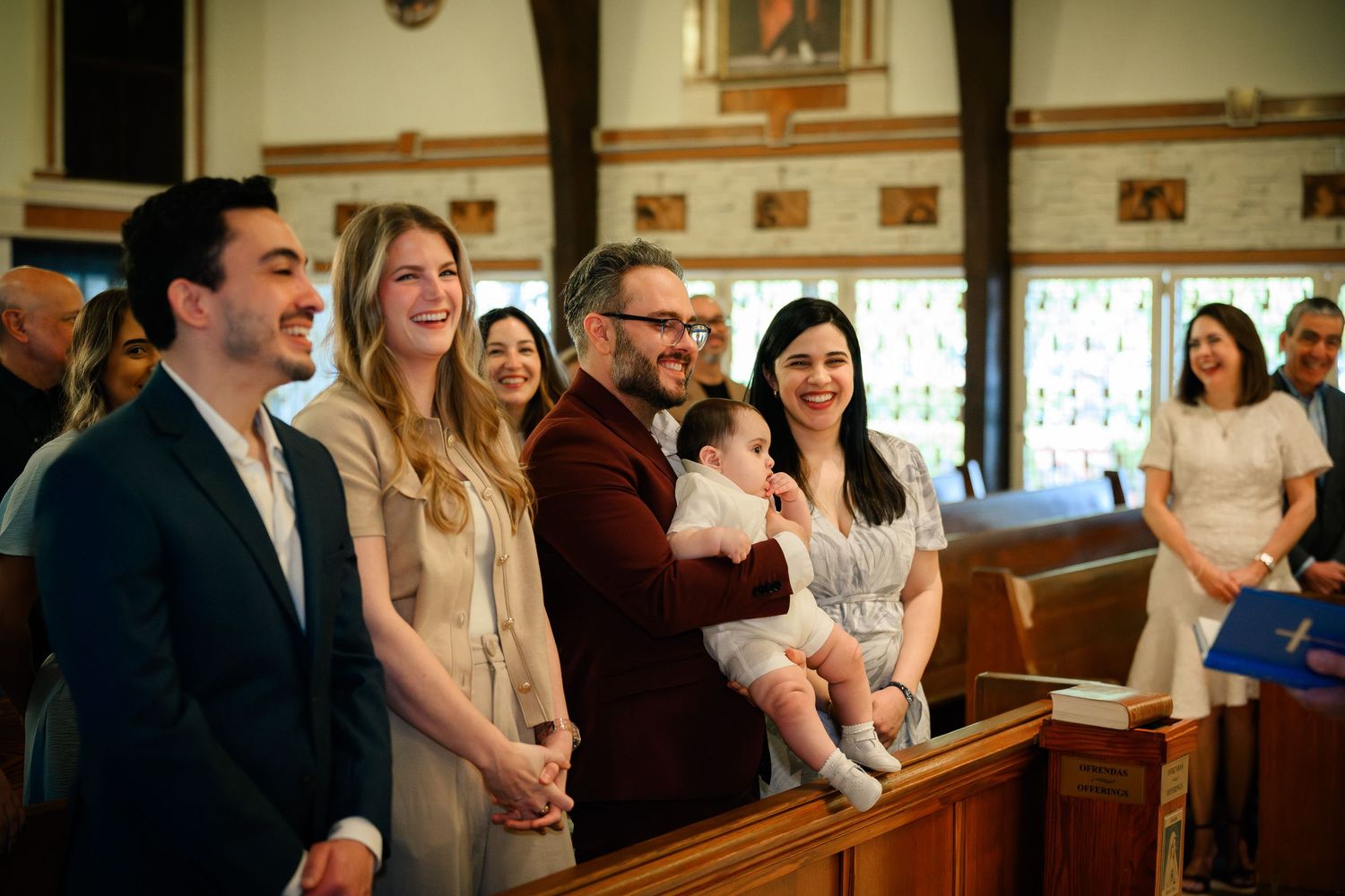 A family awaits their son's baptism in Coral Gables, FL.