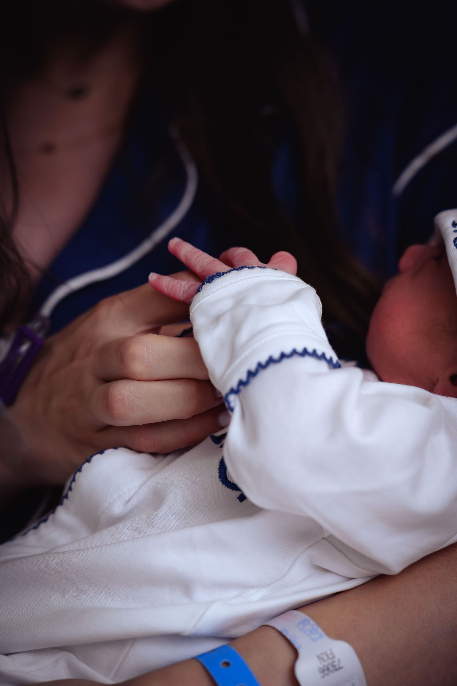 A close-up series showing hands stitching white fabric with blue thread in a sewing sequence.