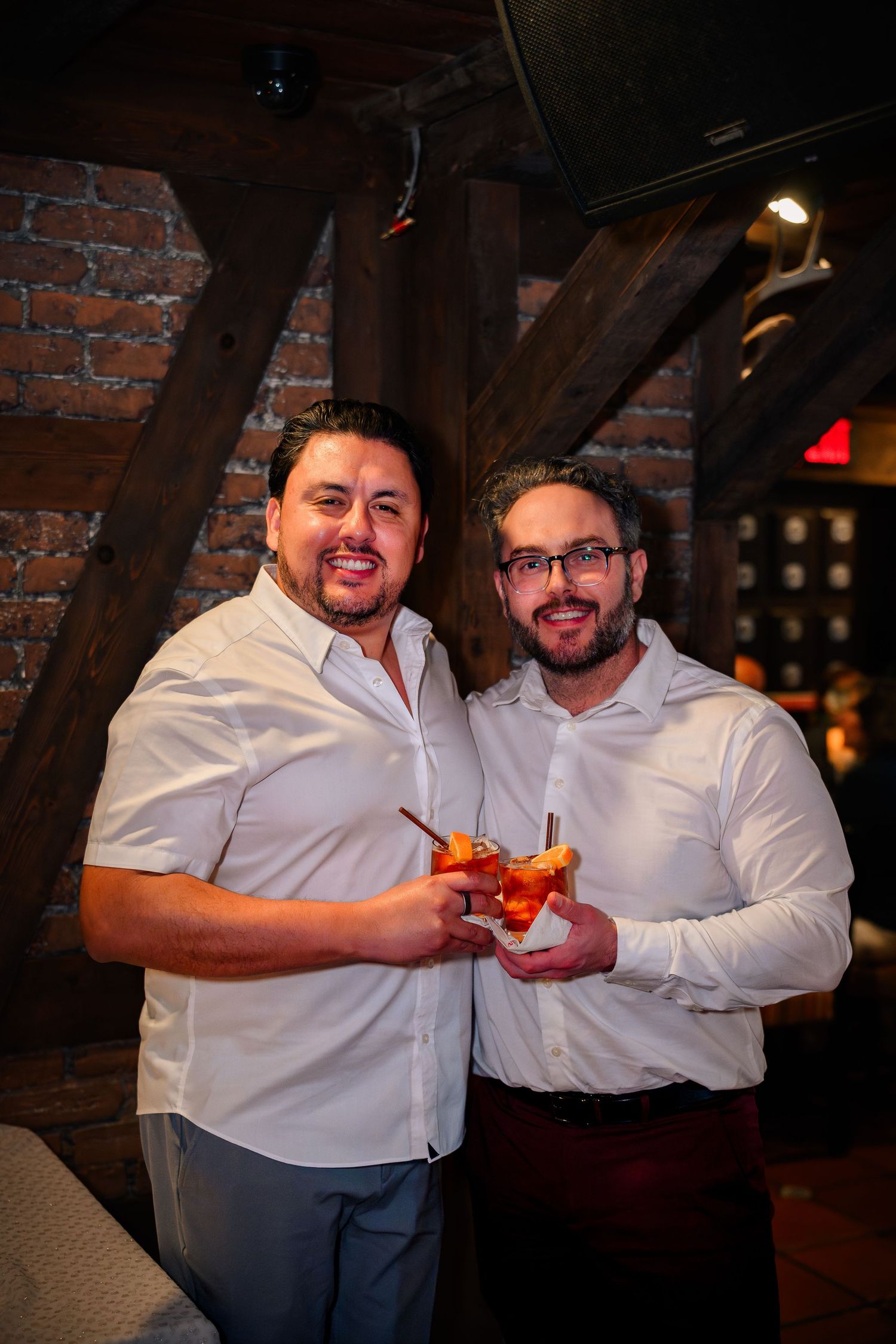 Two best friends posing at a Baptism lunch hosted at Casa Juancho in Pequeña Habana, Miami, FL.
