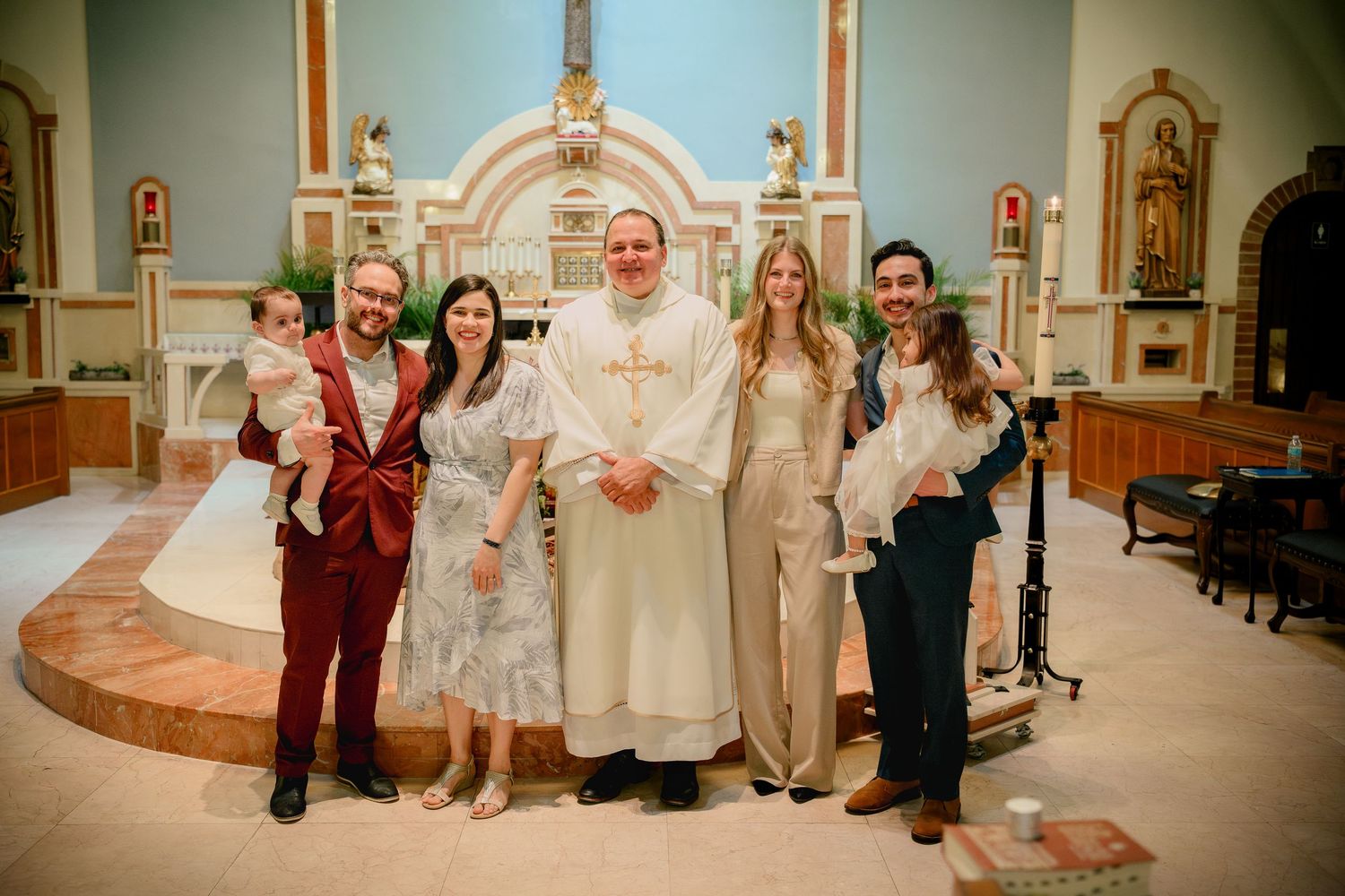 A family portrait from a Catholic baptism at St. Raymond, Coral Gables, Miami FL