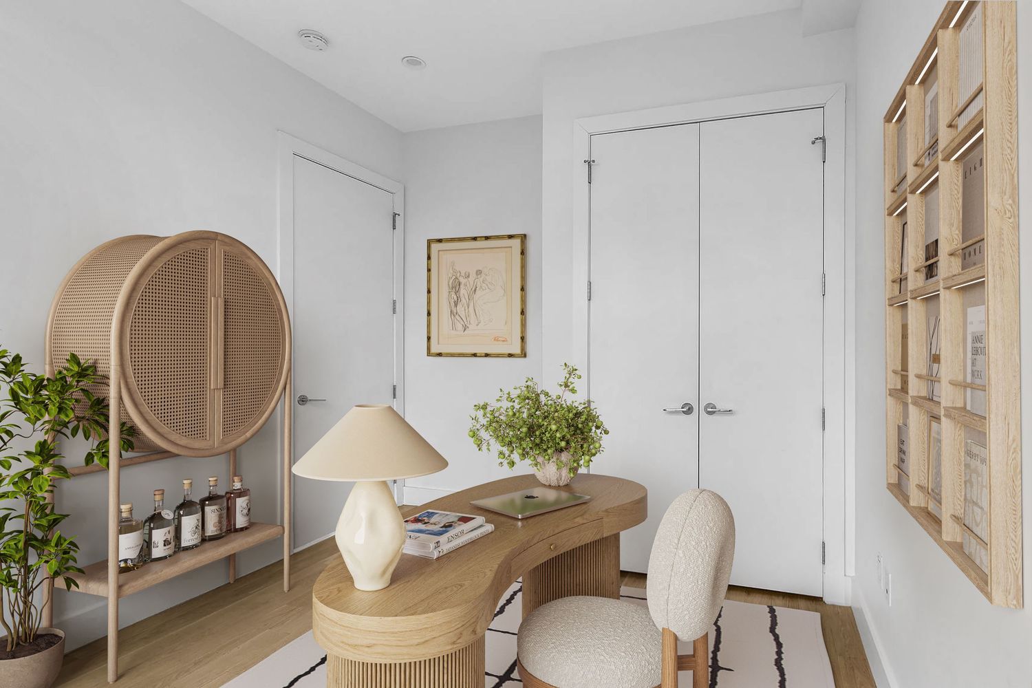 Minimalist home office with a wooden desk, rattan chair, circular shelf, and warm neutral tones.