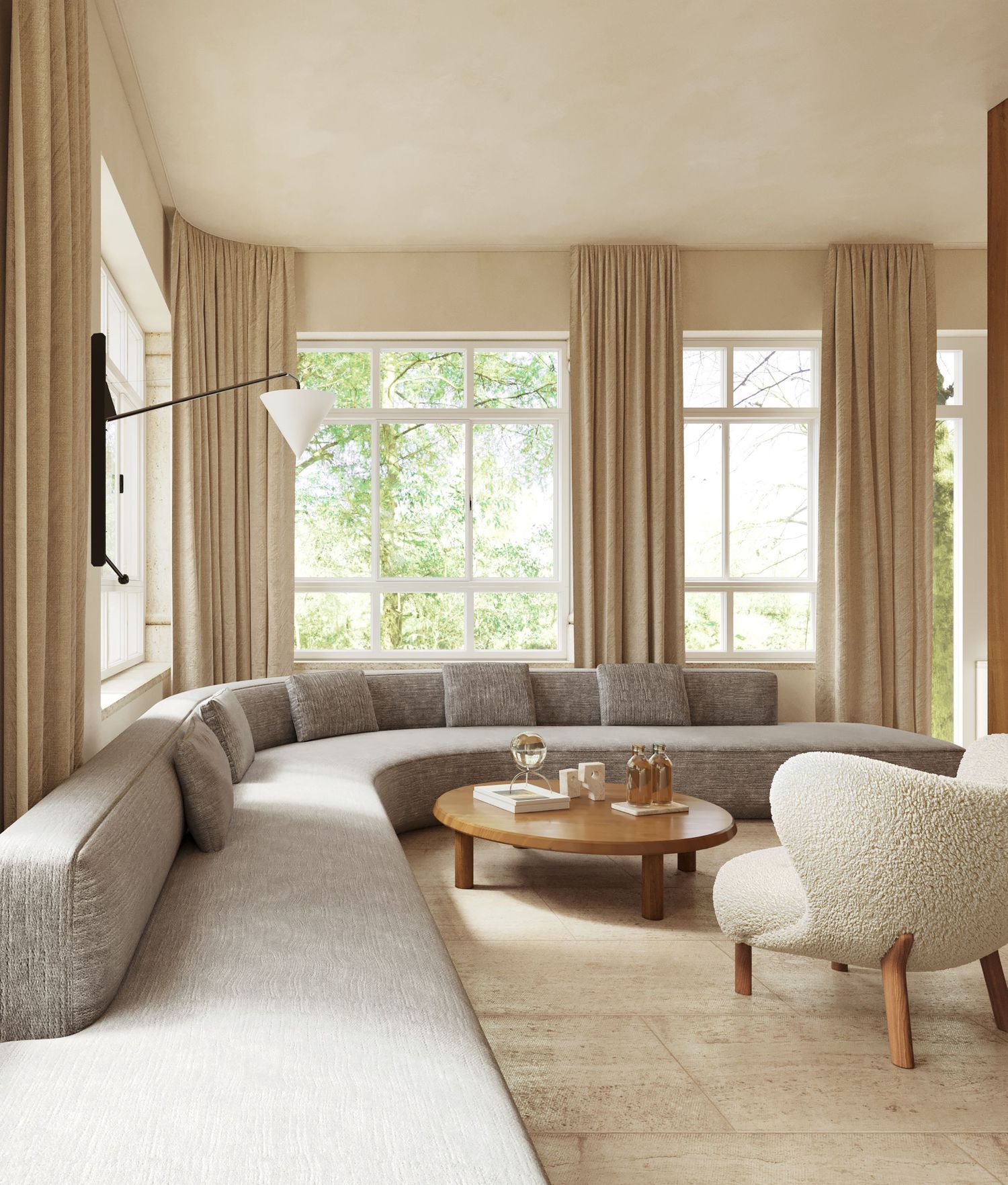 Nordic Minimalist Living Dining Room with view of living area and large round grey sofa.