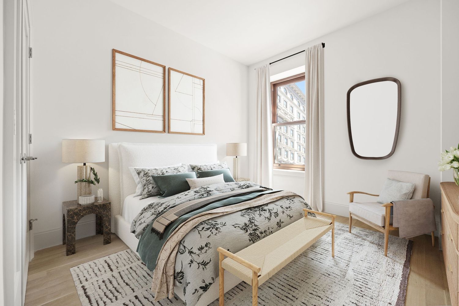 Bright Scandinavian-style bedroom with white upholstered bed, floral bedding, wood bench, and natural light from large window.
