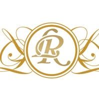 Elegant gold ornamental monogram logo with intertwined letters on a white background.