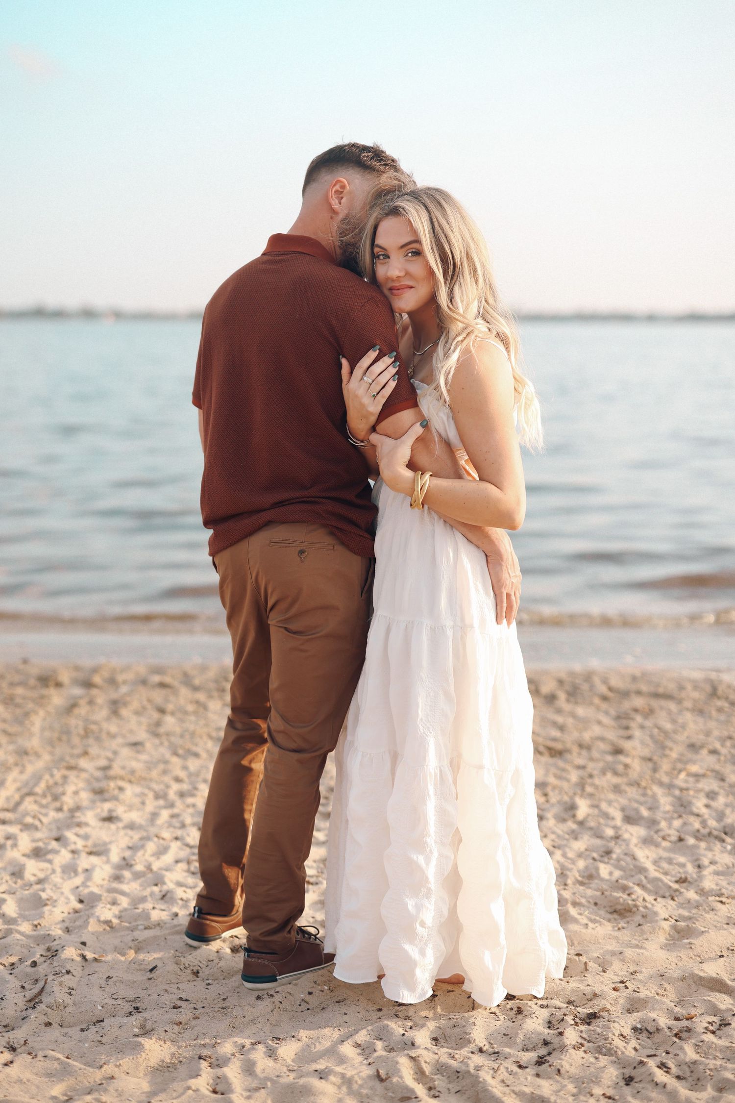portrait of a youthful couple on the beach in Lake Charles Louisiana