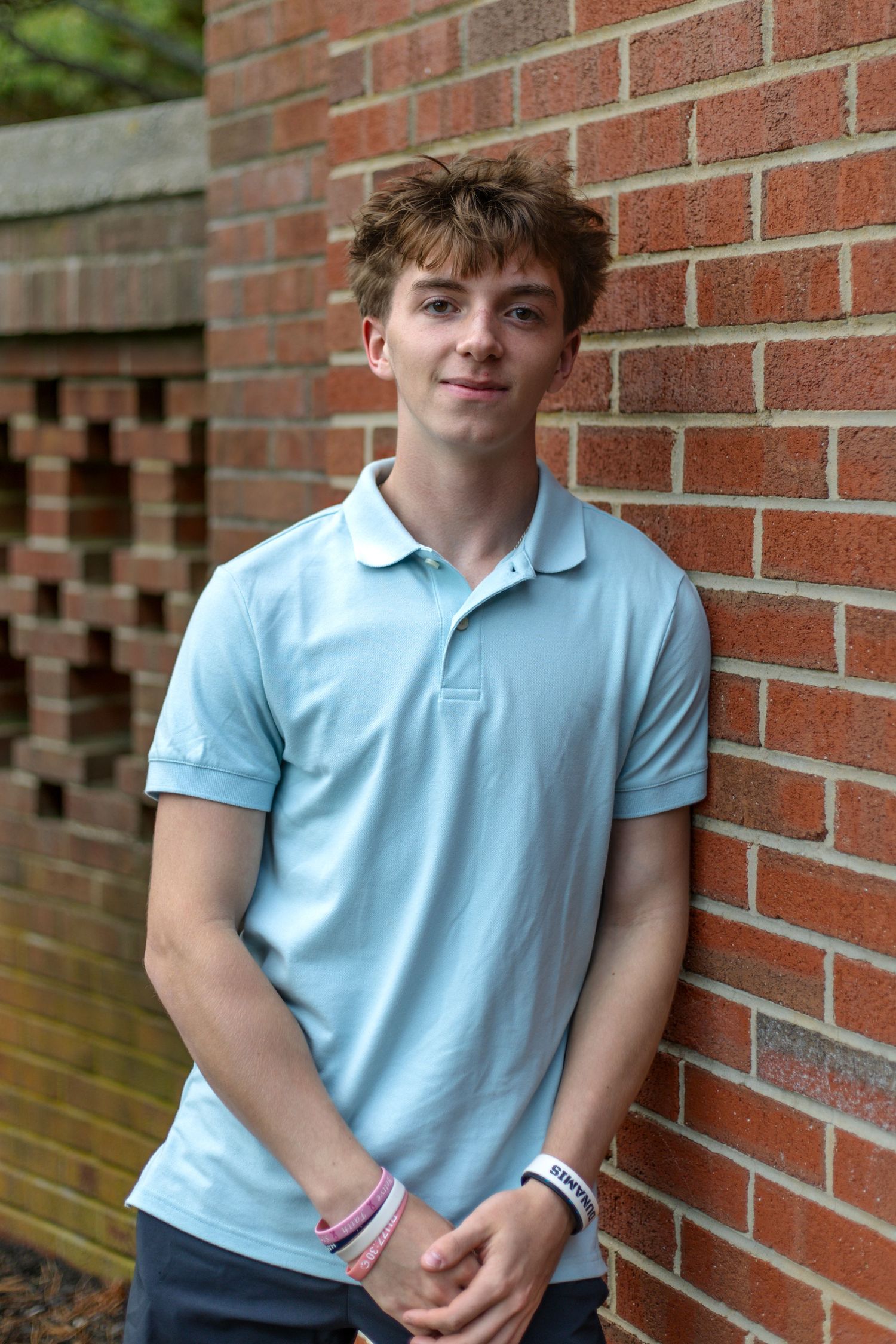 Senior portrait session showcasing personality, style, and milestone moments with a natural, timeless backdrop