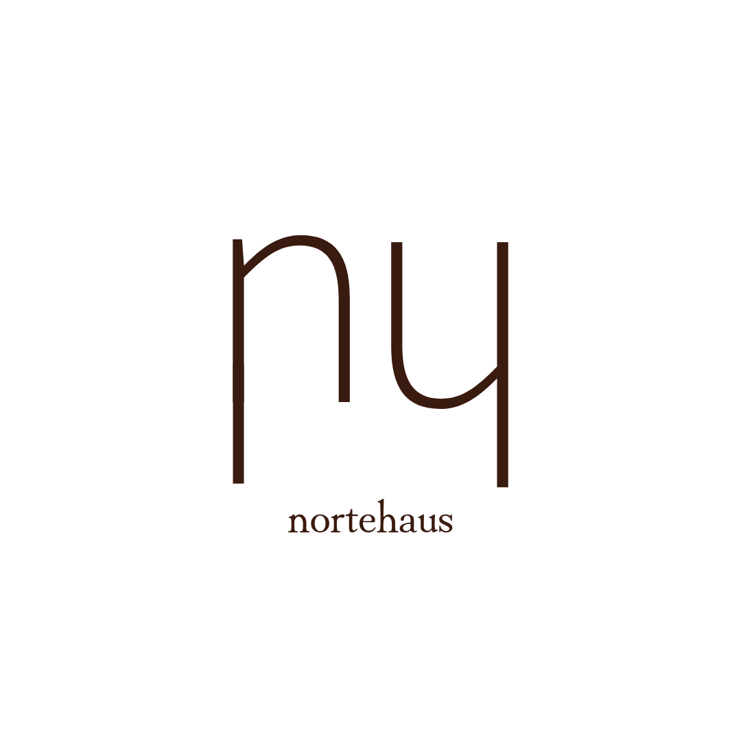 Nortehaus brand logo featuring minimalist lowercase letters n and u in dark brown on white background.