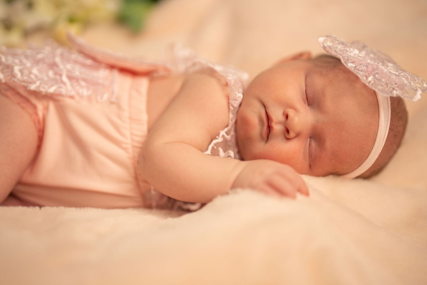 A series of soft and dreamy newborn photography shots showing delicate poses in neutral tones.