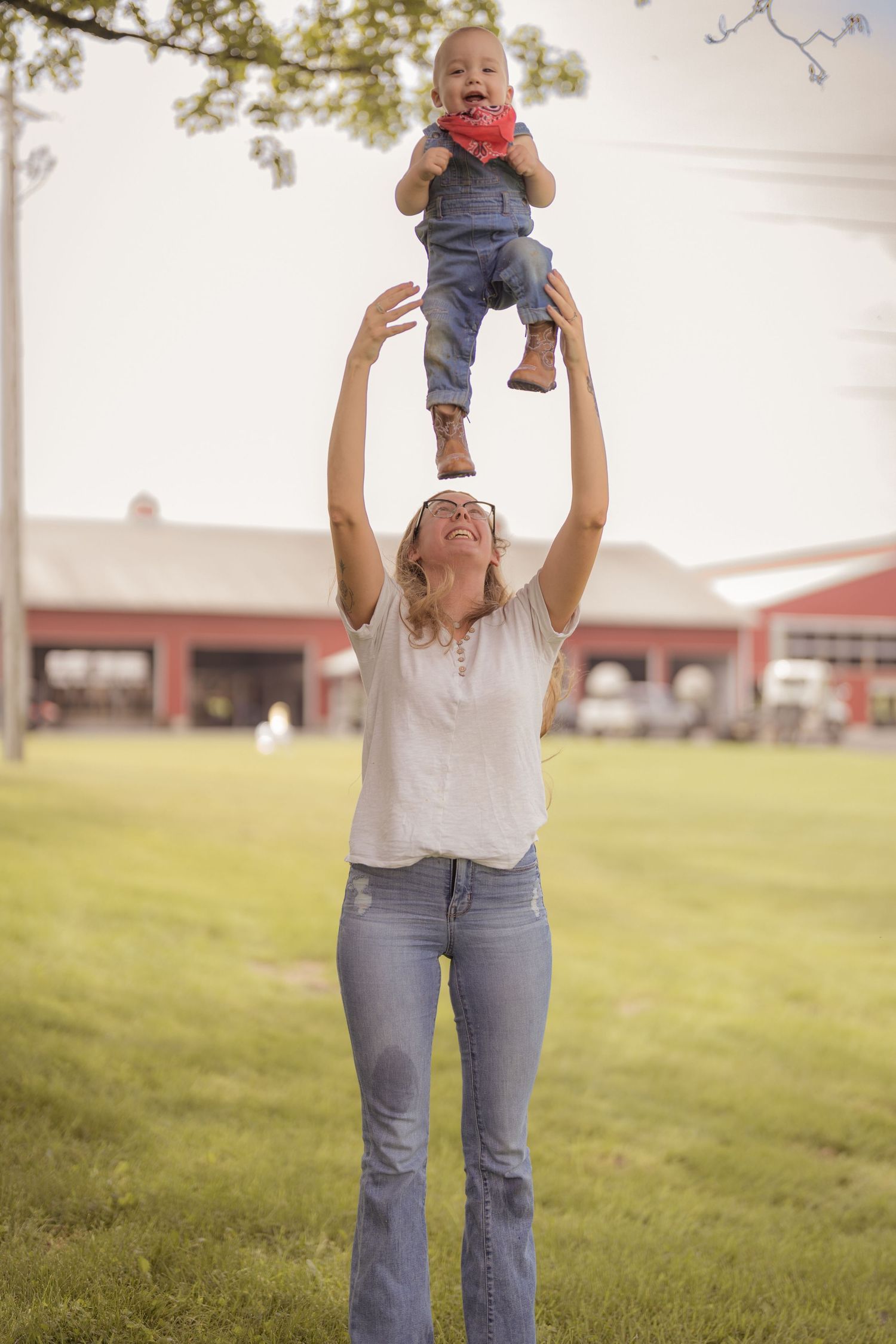 A series of playful outdoor portraits showing joyful poses on a grassy lawn.