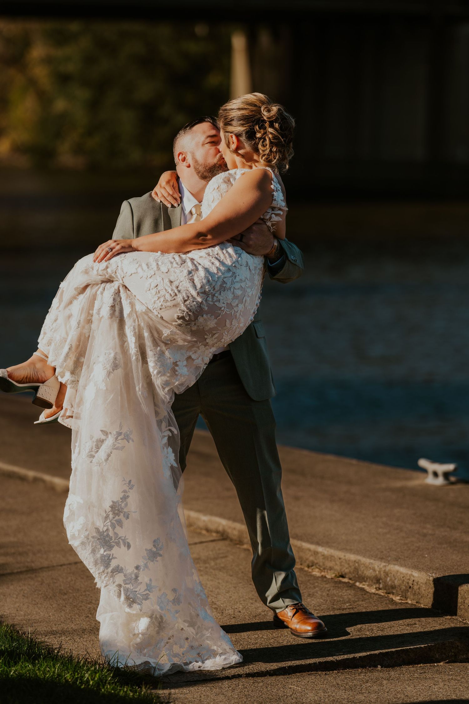A playful sequence of wedding photos showing a couple dipping and dancing in elegant formal attire.