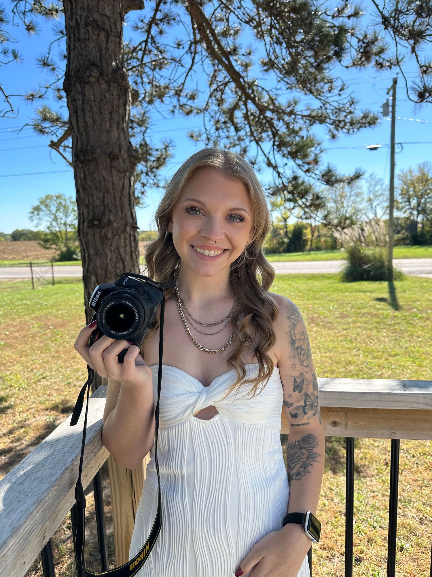 Photographer holding her camera