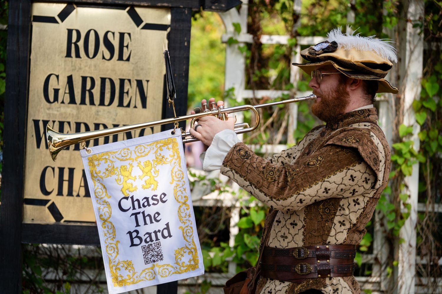 Vintage wooden signs and rustic decor displayed in a garden setting with weathered textures and natural elements.