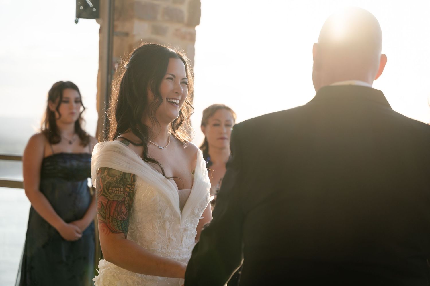 Sunset wedding ceremony with beautiful natural lighting and emotional vows.