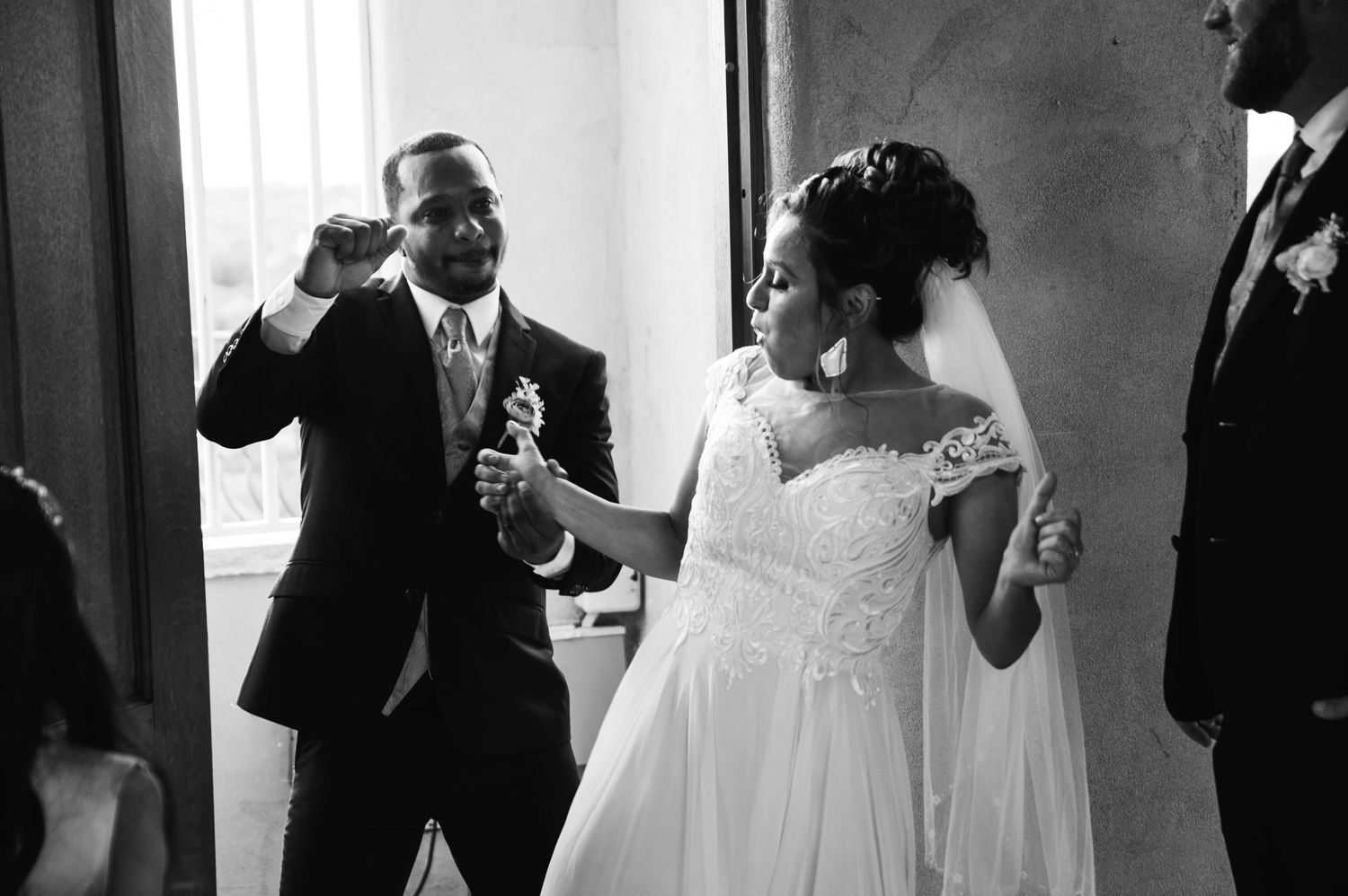 A playful moment shared between newlyweds during their wedding celebration.