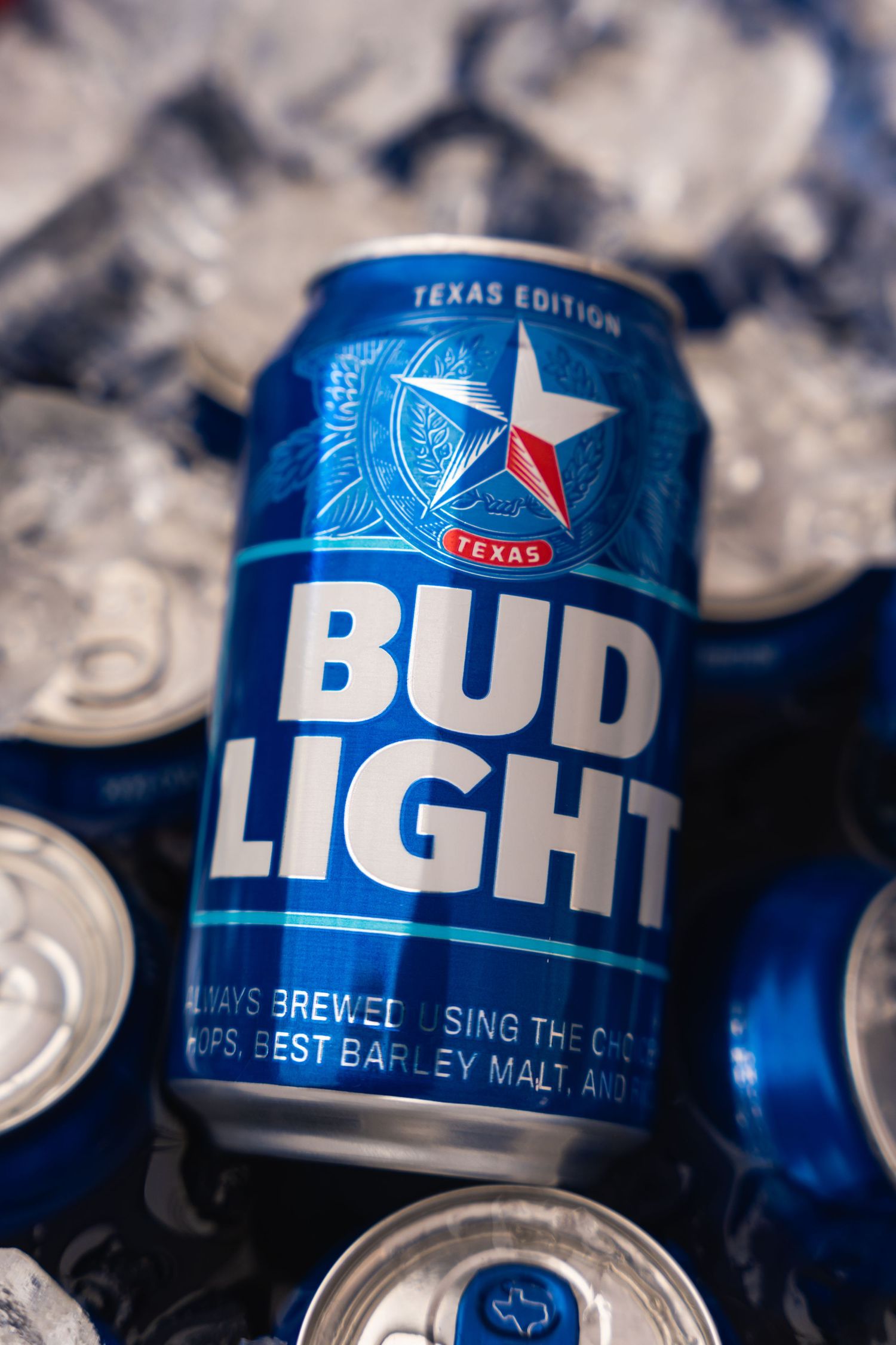 Texas Edition Bud Light can on ice with distinctive star logo.