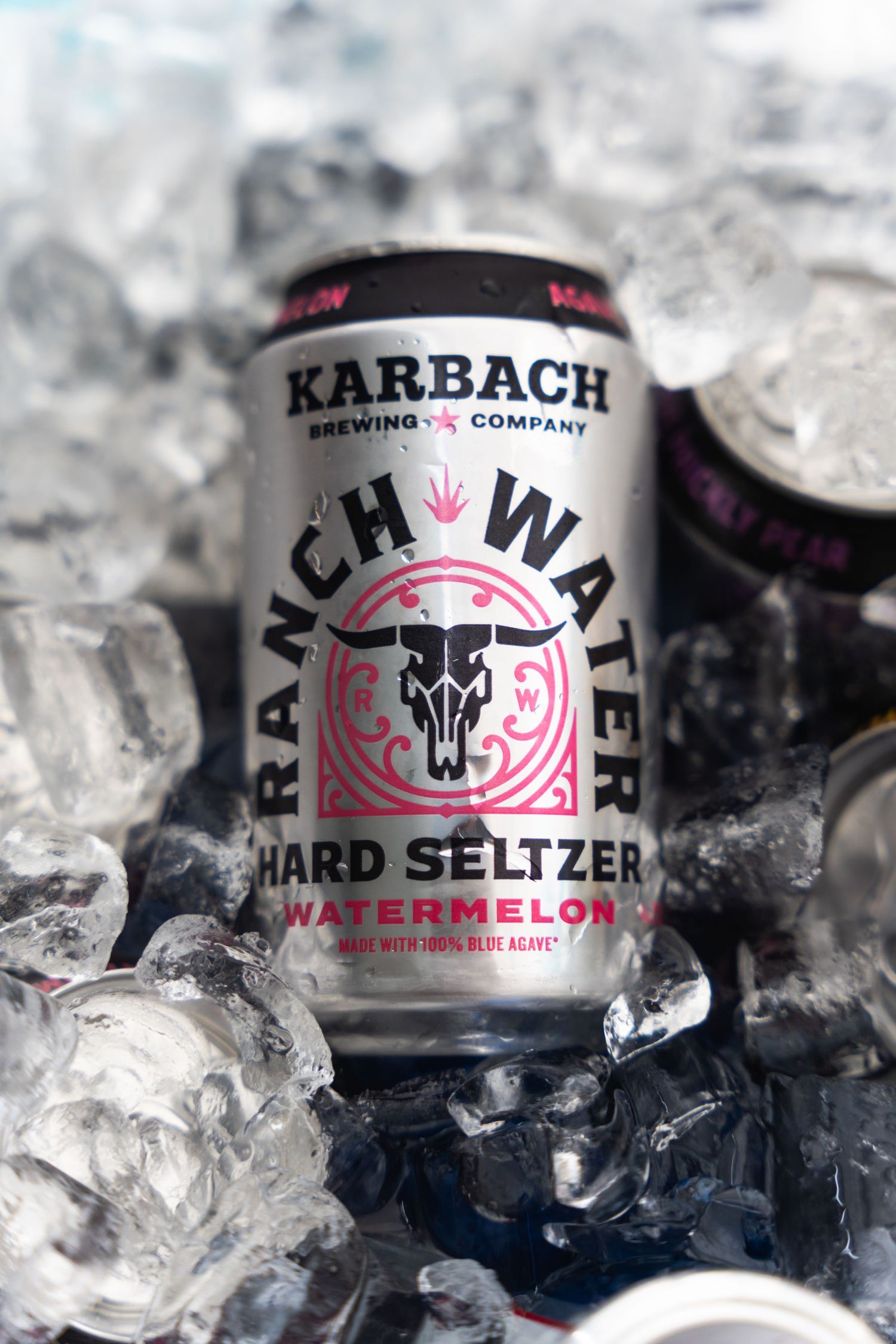 Karbach Ranch Water hard seltzer can nestled in ice with geometric skull logo design.