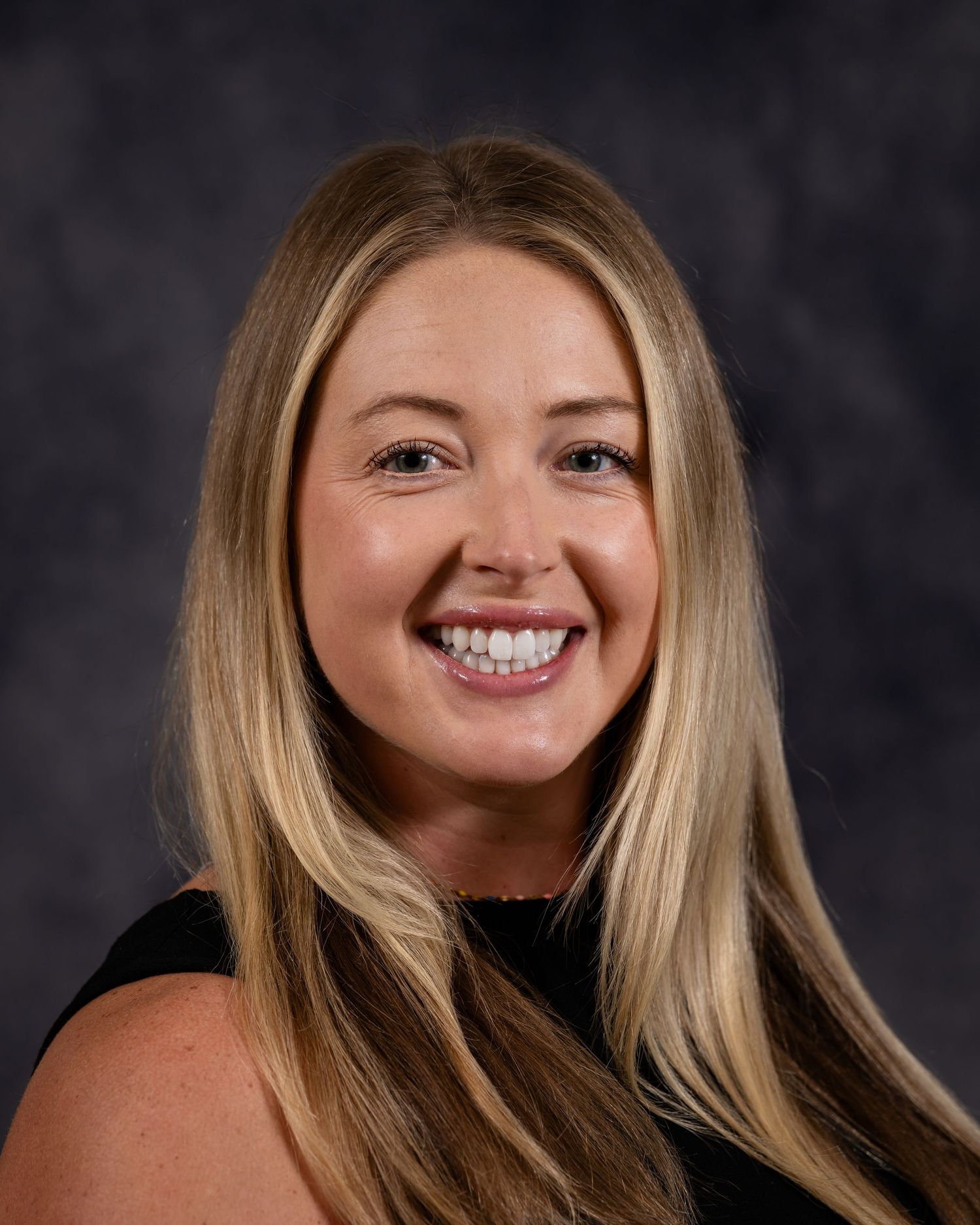 A series of professional headshots showing a smiling person with blonde hair against a dark background.