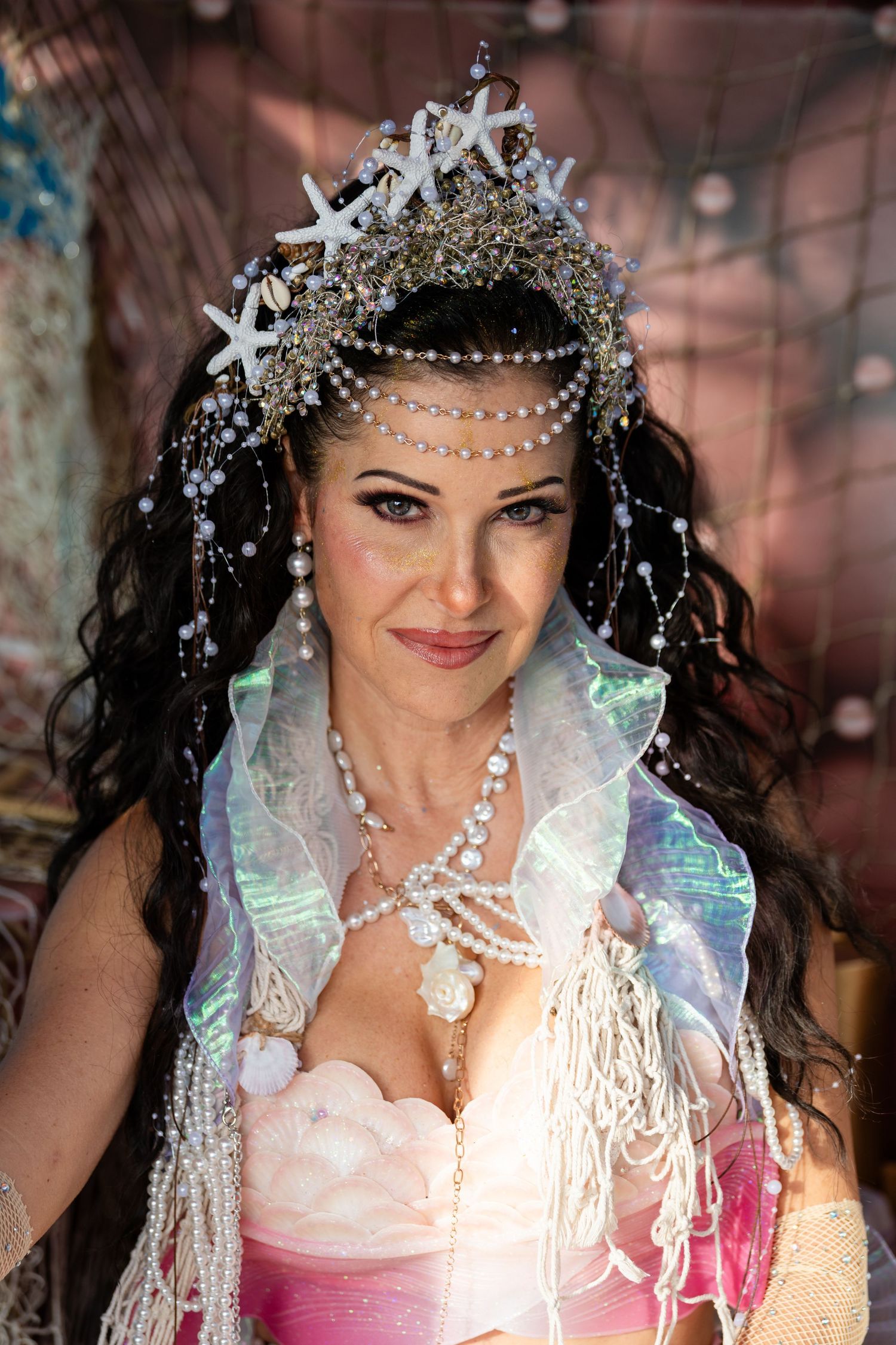 A collage of images showing an ornate bridal headpiece with pearls, crystals and starfish decorations.