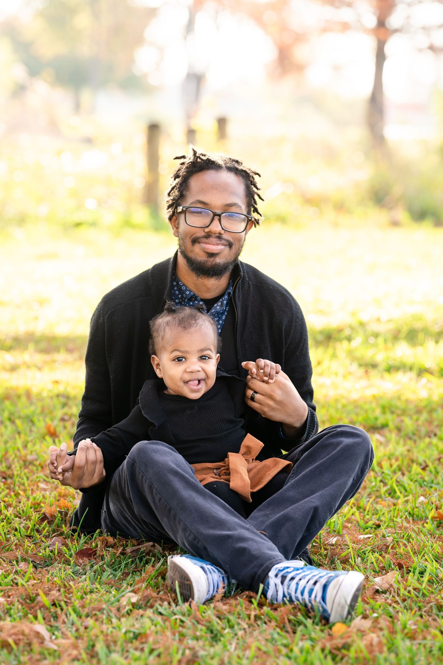 A heartwarming outdoor photo session in a park setting.
