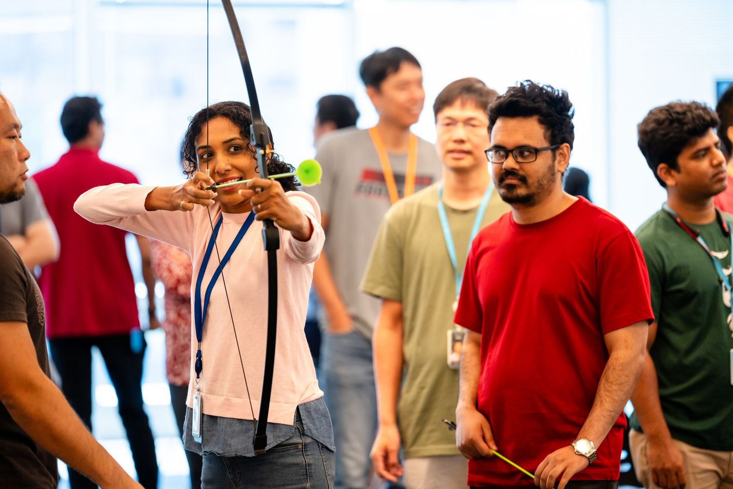 Diverse group of students collaborating in a casual educational environment during a workshop session.