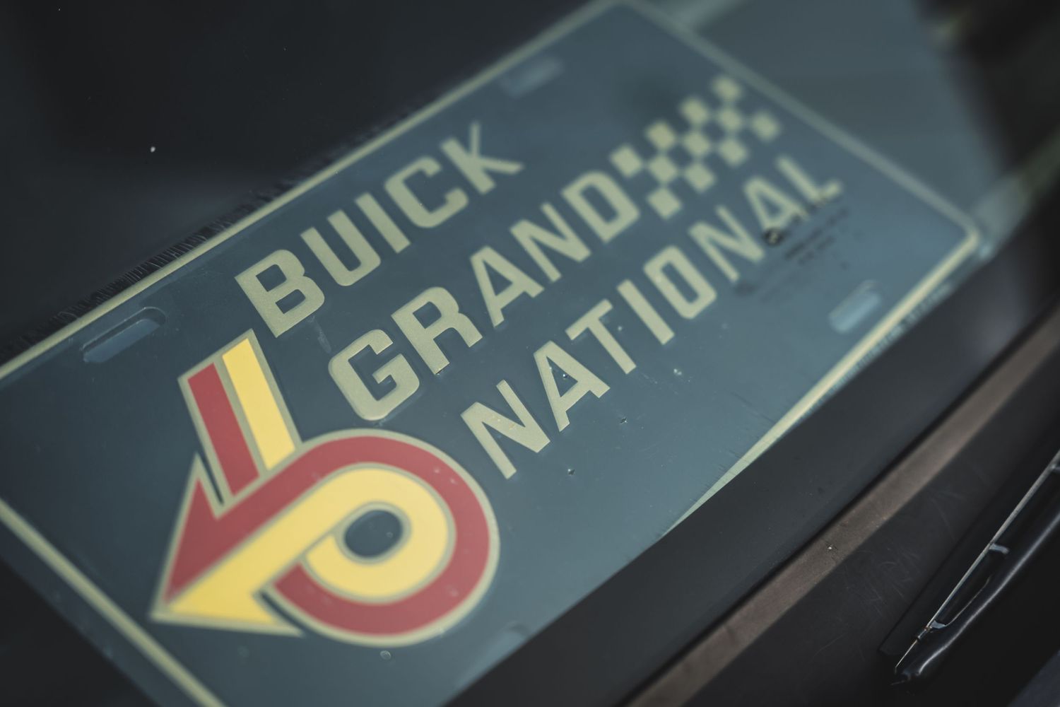 Vintage Buick Grand National badge detail shot showing retro logo design.