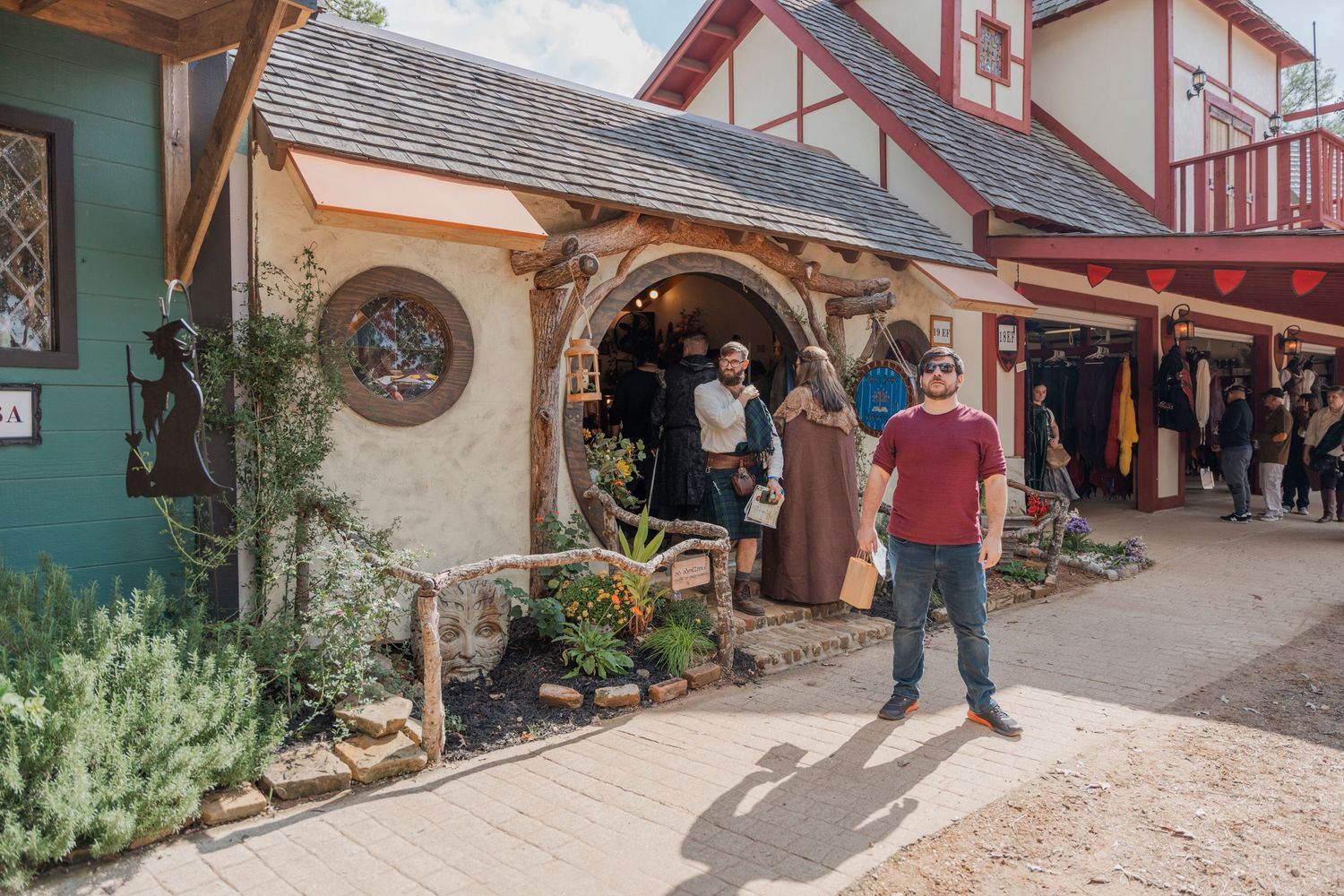 Medieval-style cottage storefront with tudor architecture at a Renaissance festival.