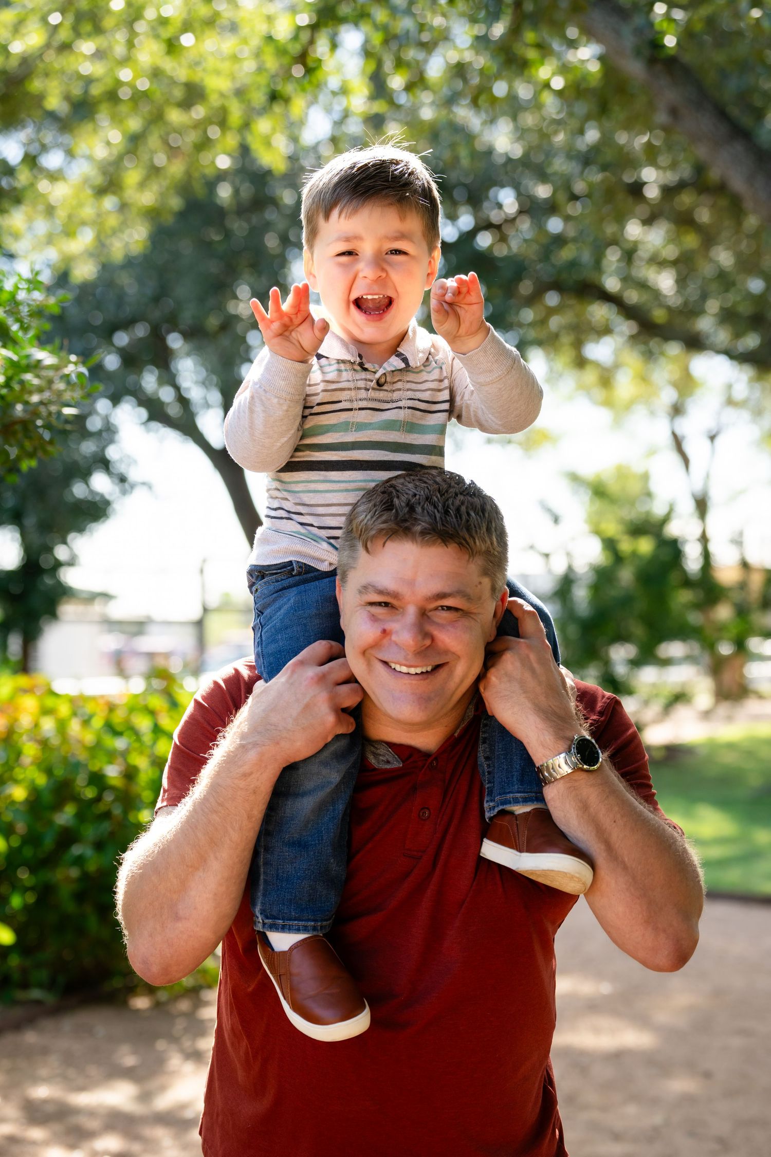 A joyful moment captured in a series of playful outdoor photos showing expressions of happiness and laughter.
