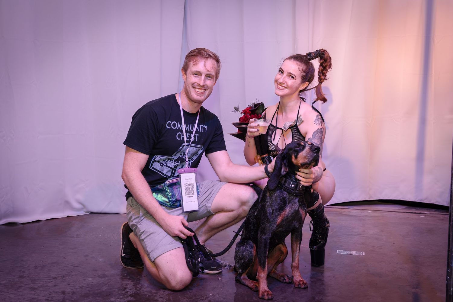 A group of performers taking a photo together during a show.