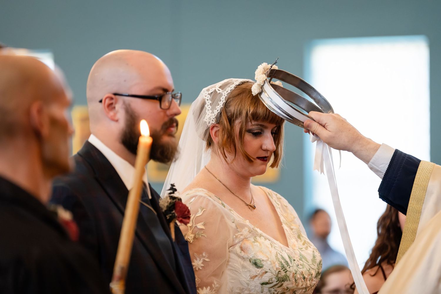 A series of intimate wedding ceremony moments showing the couple exchanging vows and rings at the altar.