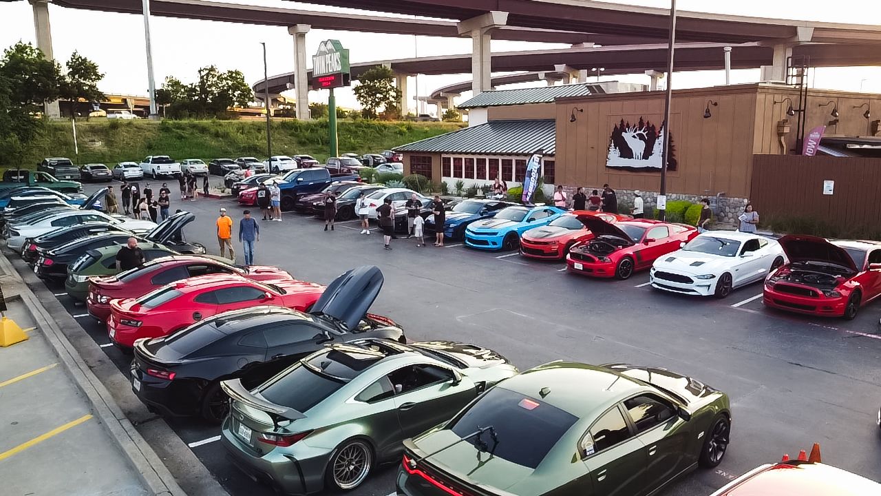 Car meet at Twin Peaks featuring a diverse lineup of modified and performance vehicles.
