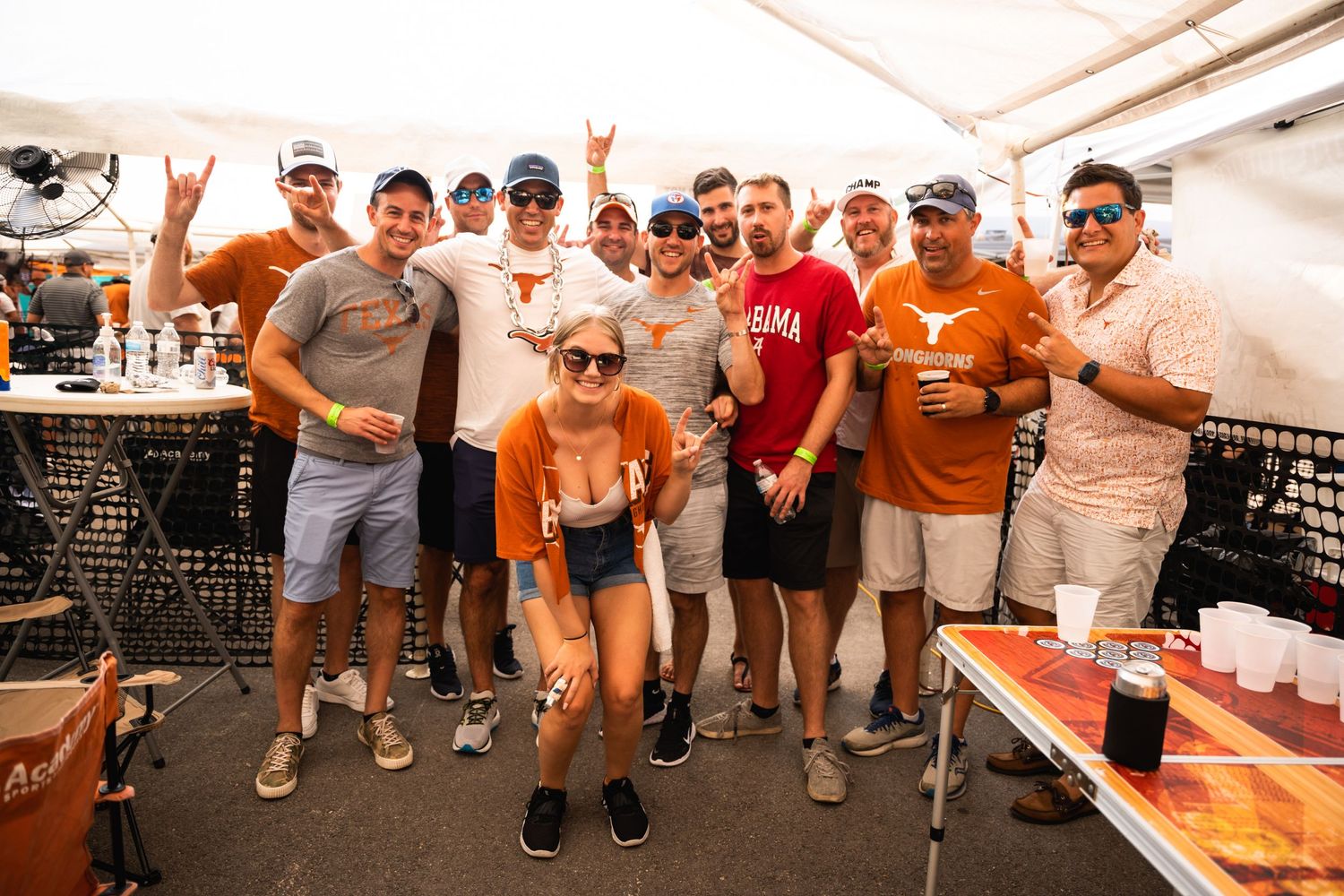 Casual group photo at an outdoor entertainment event.