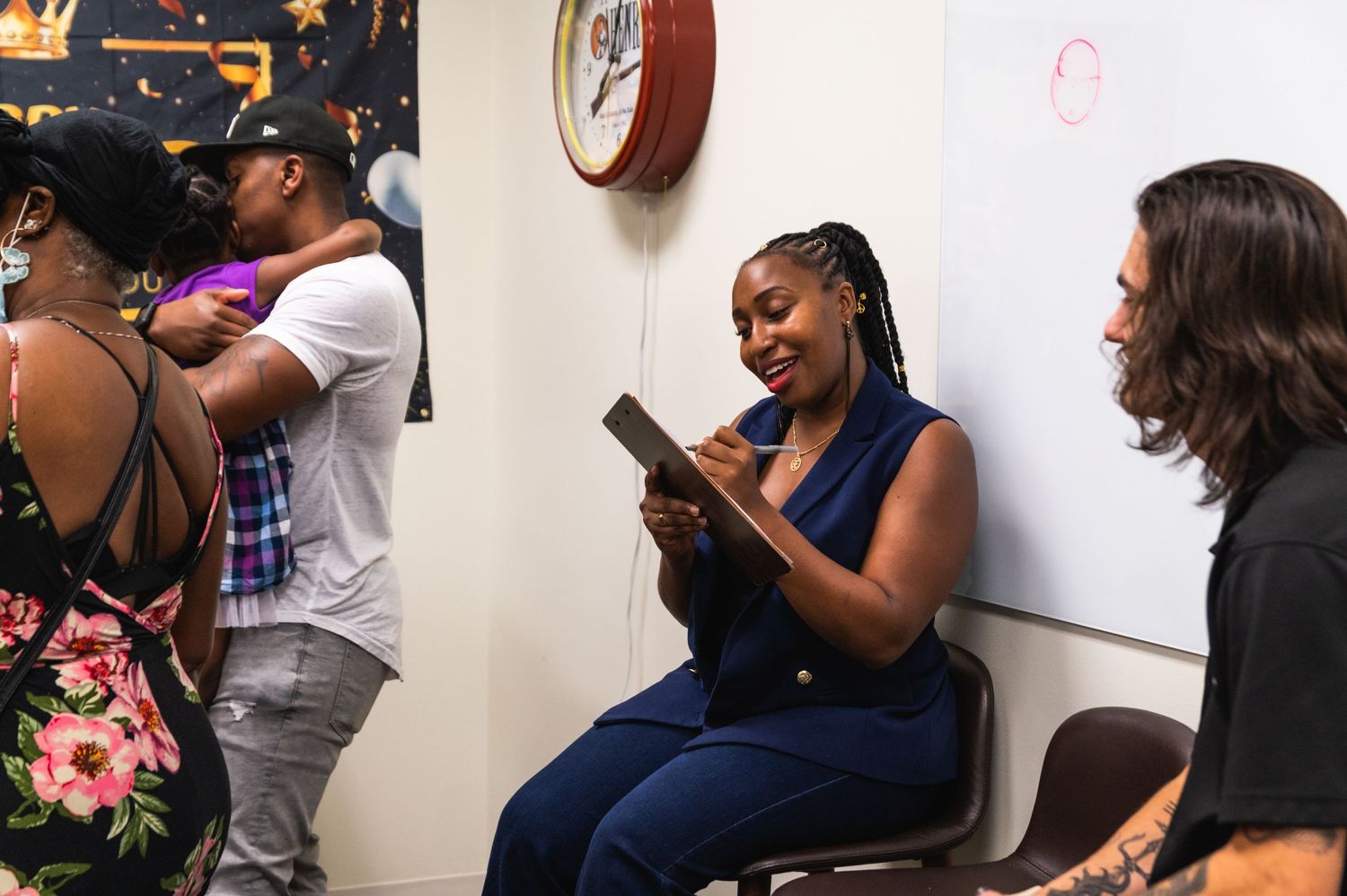 Students reviewing materials during a training session in a classroom setting.