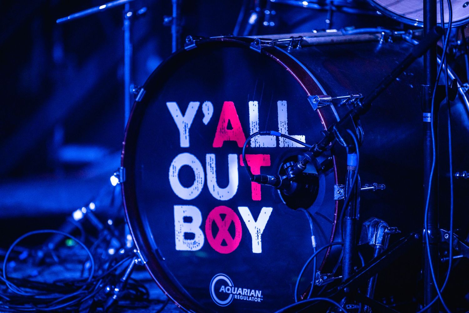 Blue-lit drum kit with 