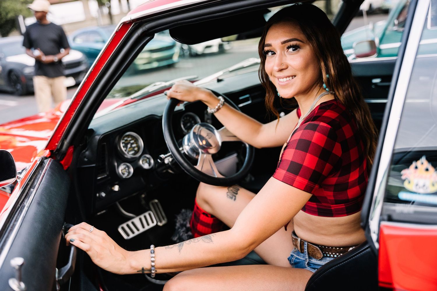 Vintage red Chevrolet interior with plaid and denim styled photoshoot.