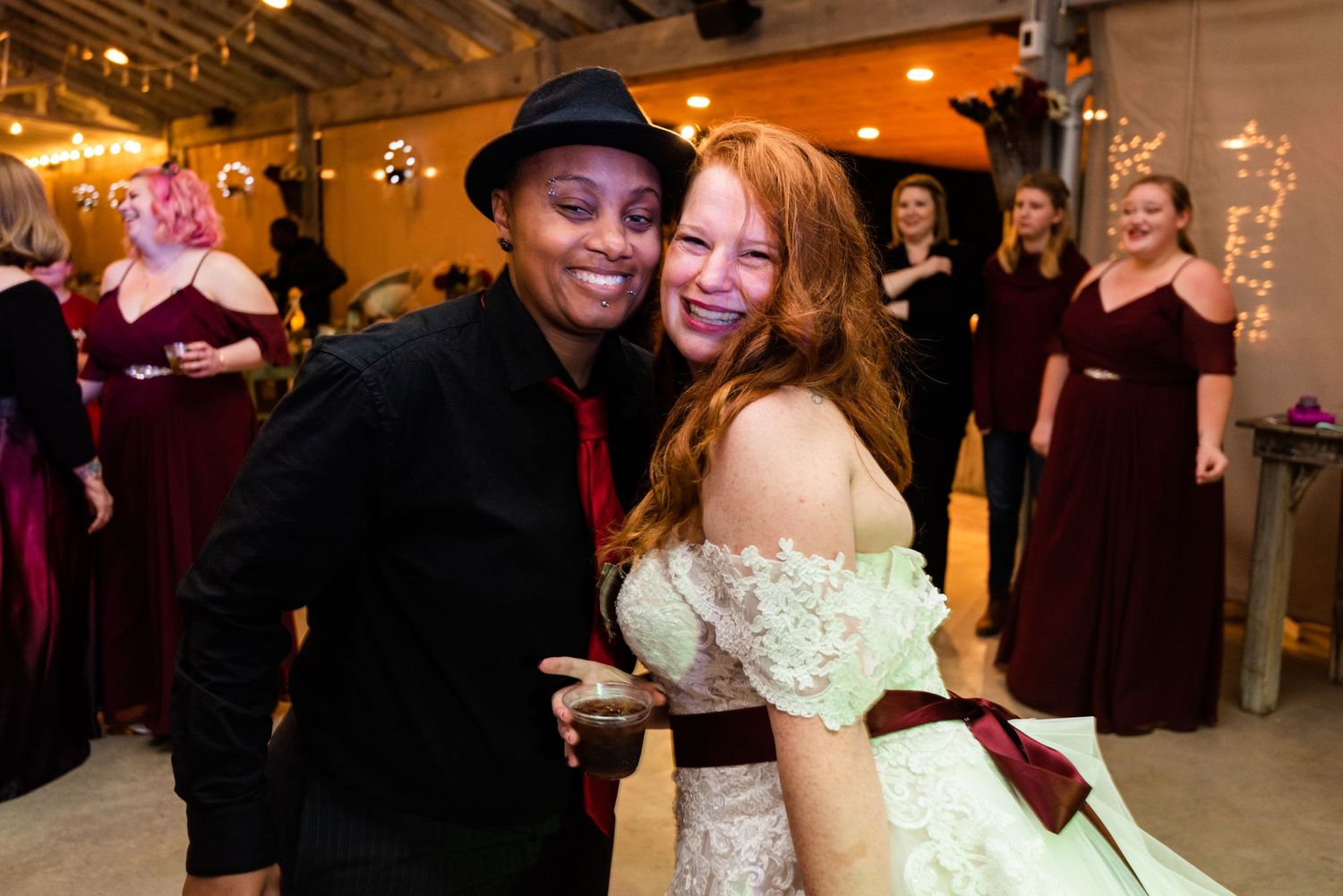 Wedding celebration with guests dancing and enjoying the festive atmosphere.