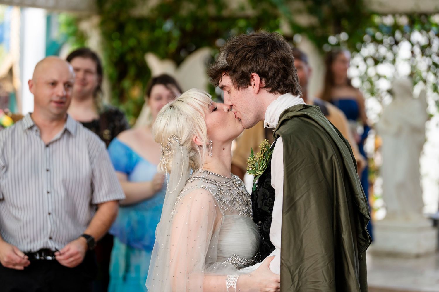 A series of candid moments captured at a wedding reception with guests mingling and dancing in a festive atmosphere.