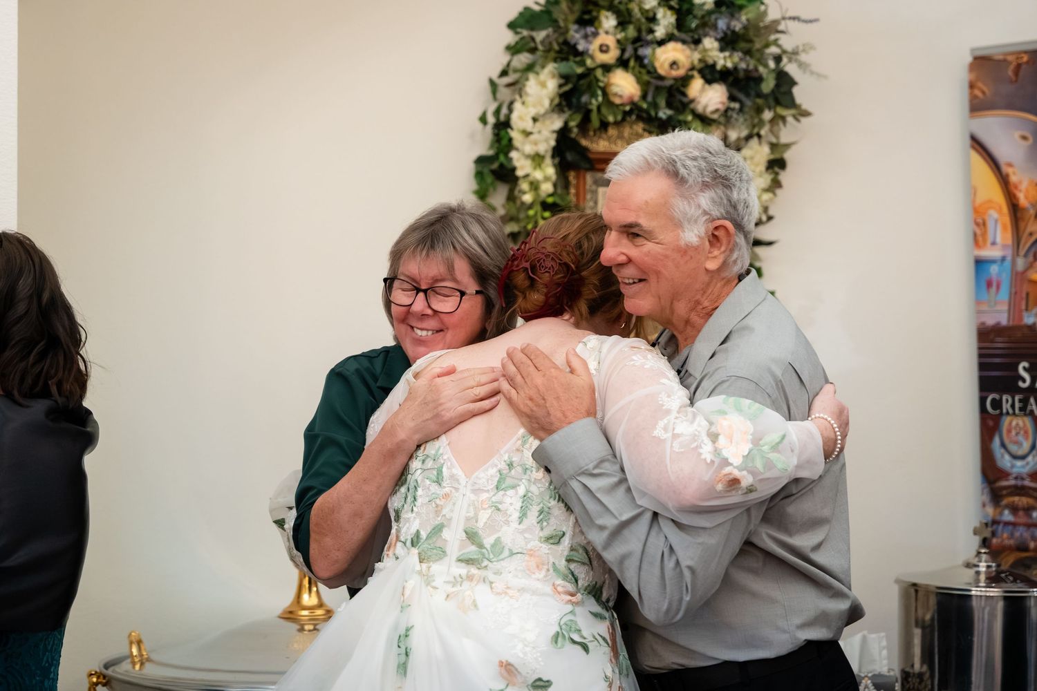 A series of candid moments showing two people embracing emotionally at what appears to be a celebration or gathering.