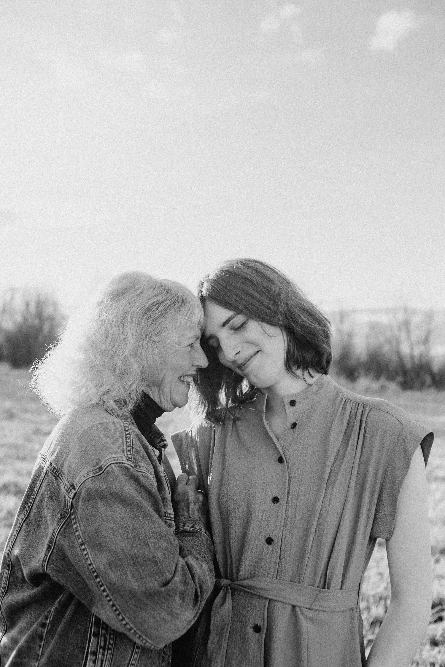Grandmother and granddaughter in the outdoors.