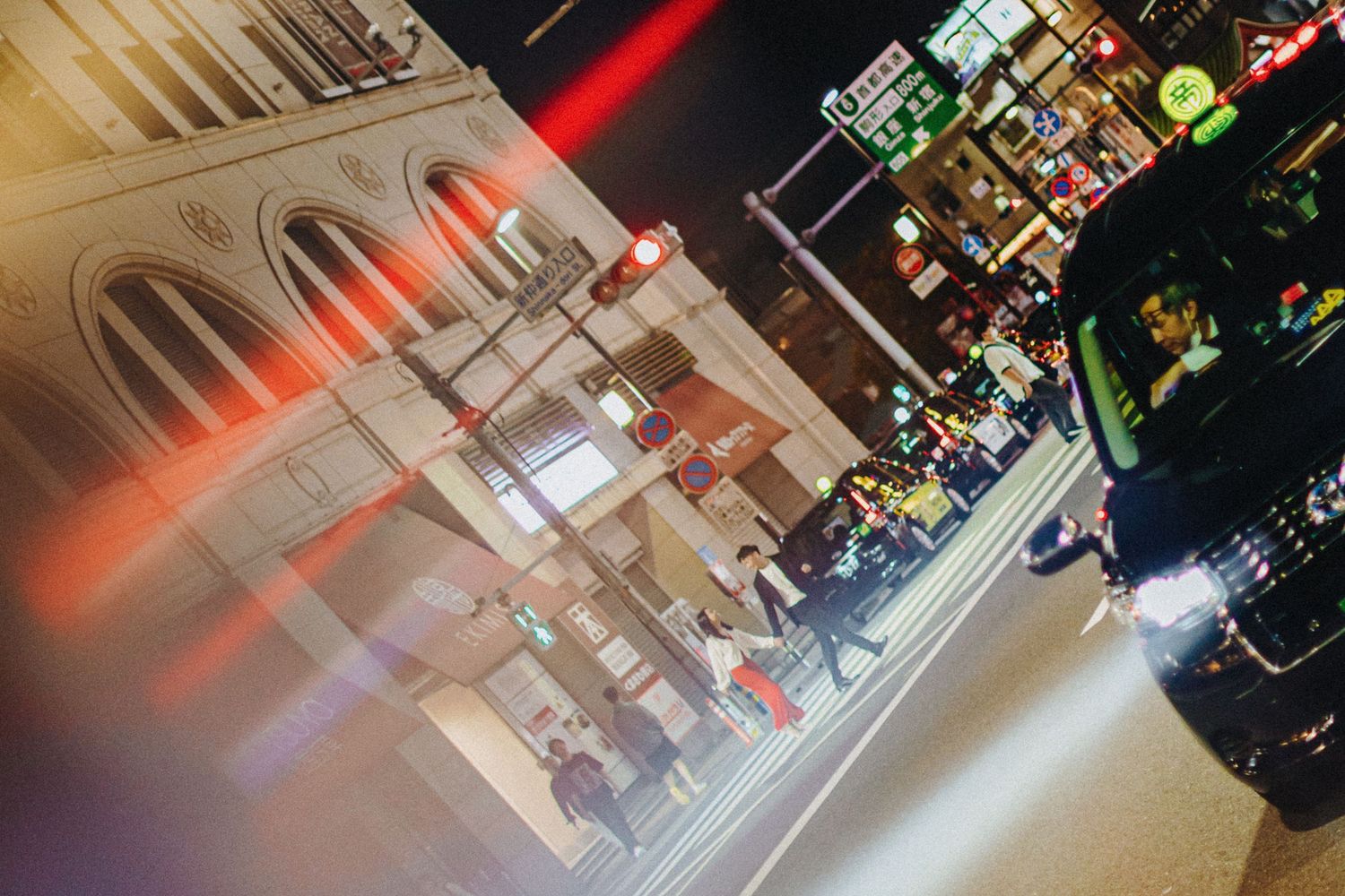 Blurred nightclub scene with dynamic lighting and motion effects.