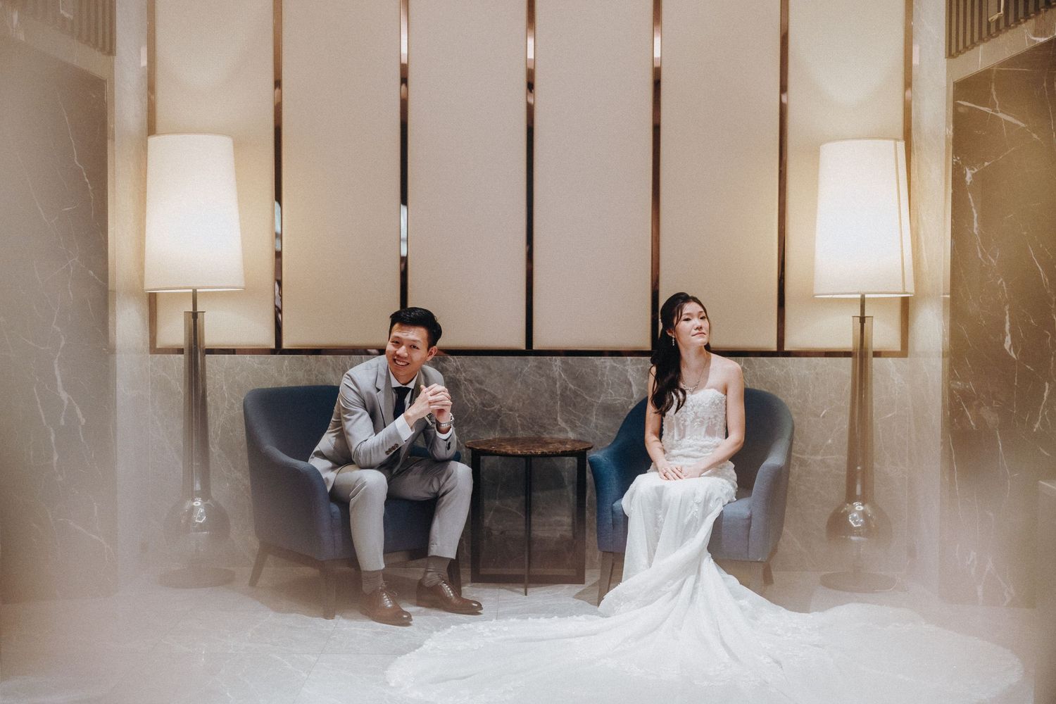 Contemporary wedding venue with pendant lights and minimalist decor.