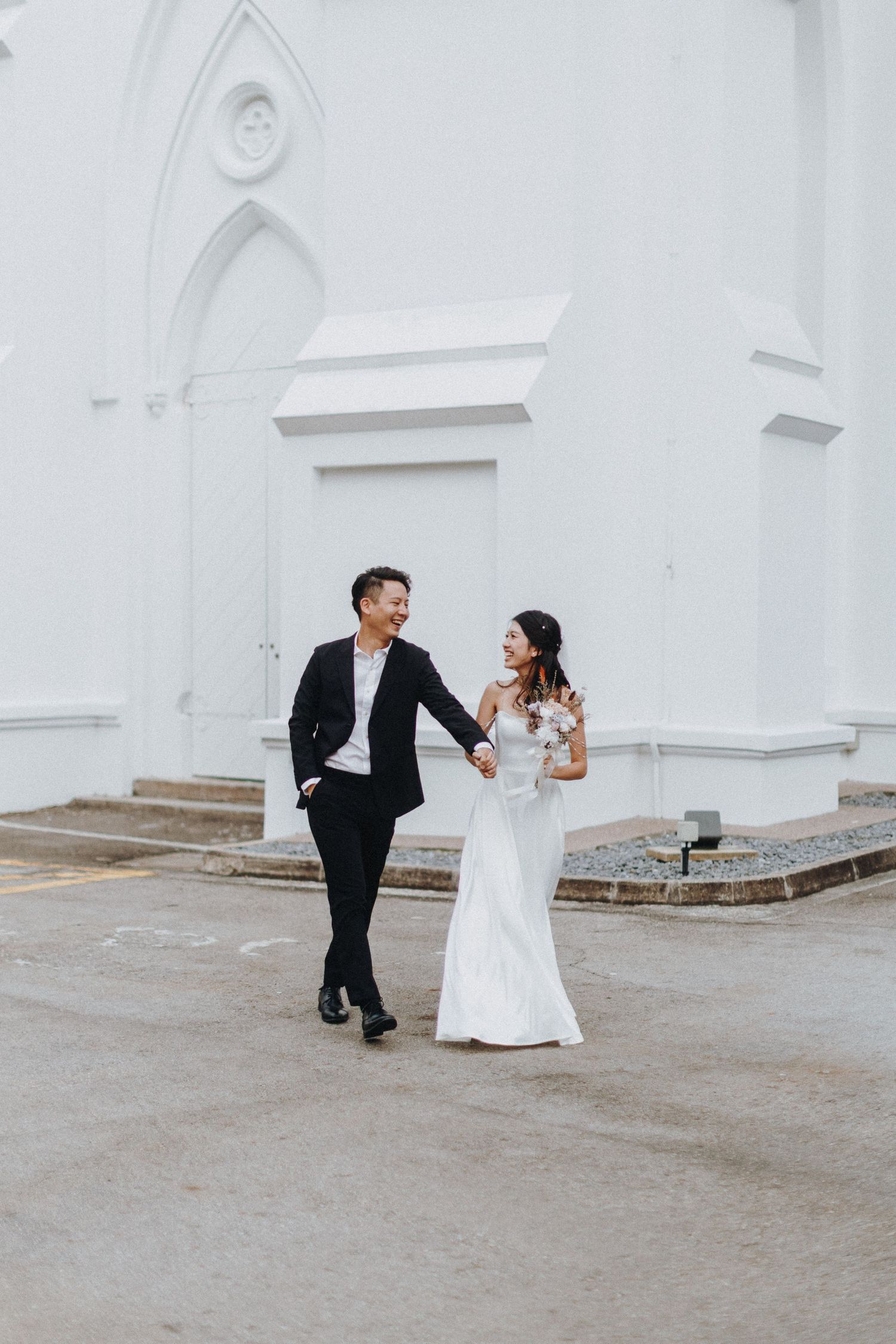A series of white church wedding photos showing a fun dance sequence between a pair in formal attire.