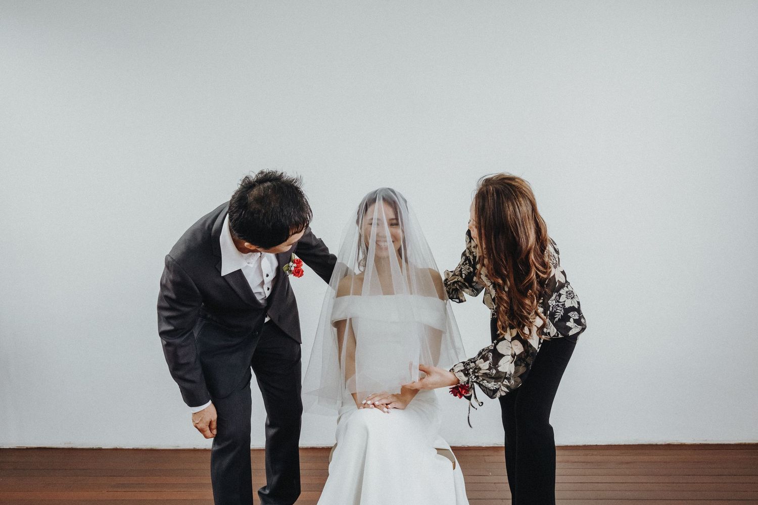 Black and white wedding photo series showing intimate moments between couple during romantic outdoor ceremony.