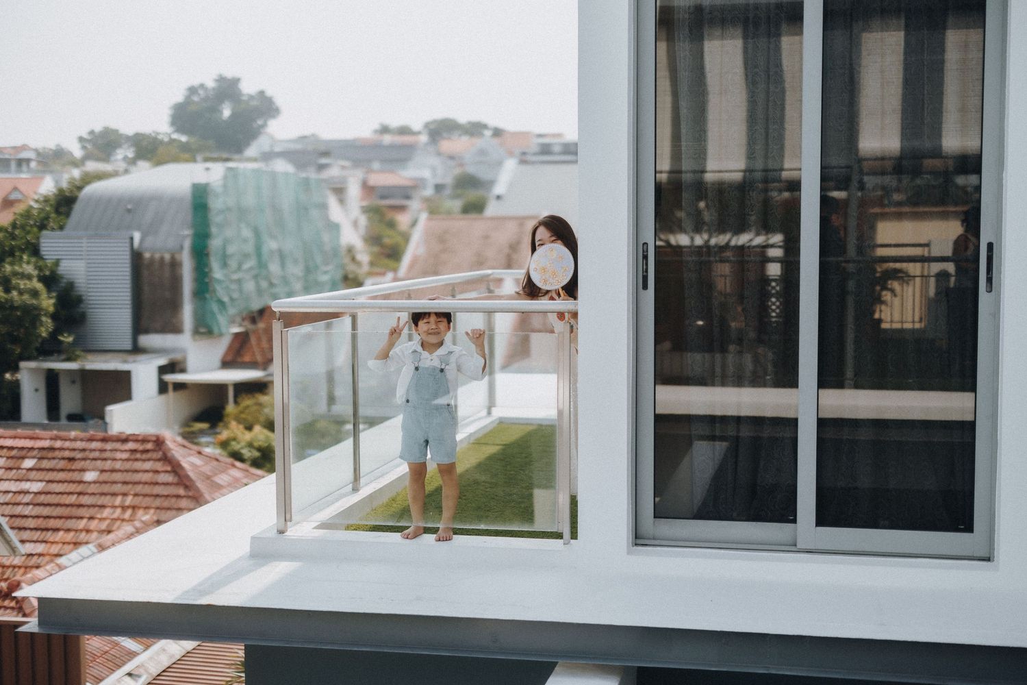 Modern glass windows with outdoor views and stylish interior design elements.